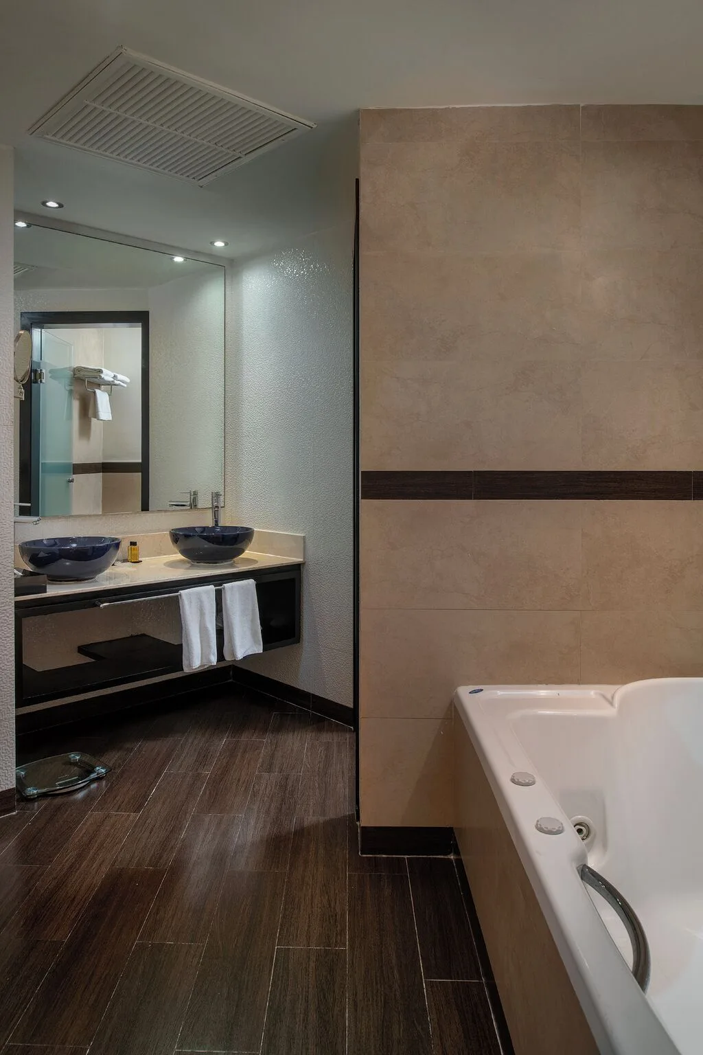 Privilege Romance Suite bathroom with Jacuzzi tub at Ocean Maya Royale.