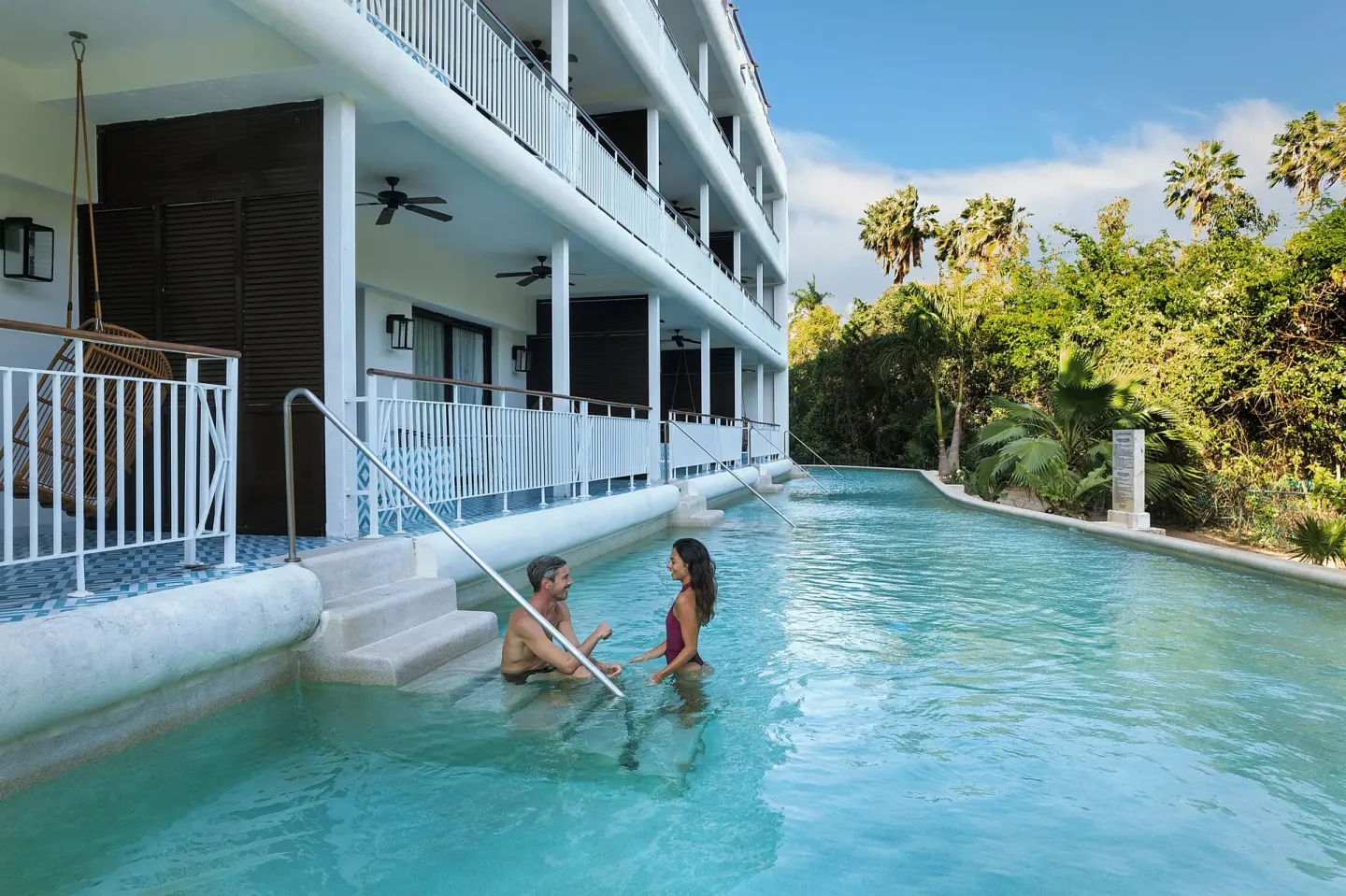 Swim-up pool outside guest room balconies at Ocean Riviera Paradise.