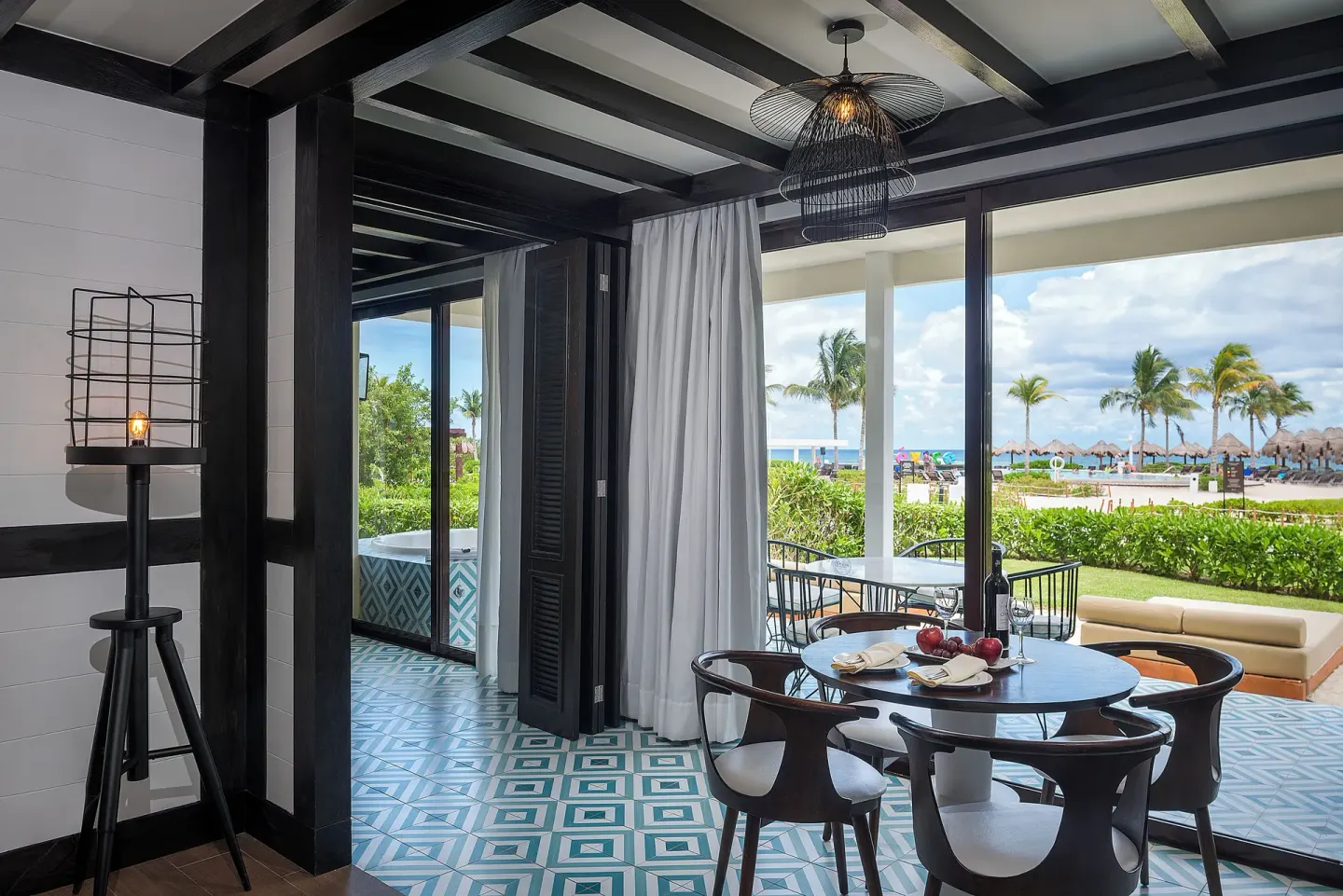 Dining area and terrace view in a Master Suite Privilege at Ocean Riviera Paradise.