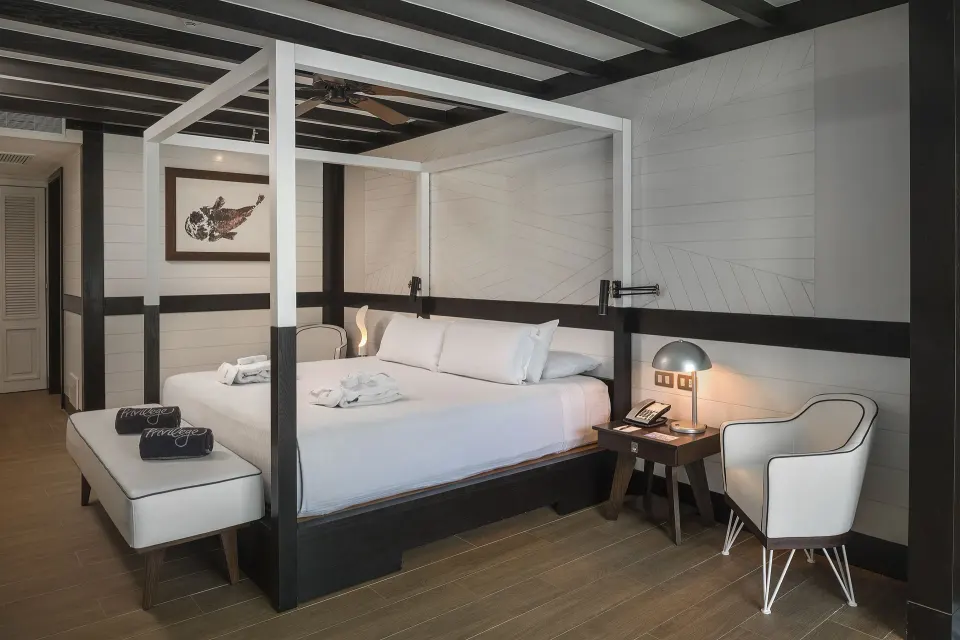 Privilege Master Suite Nature View bedroom with king bed at Ocean Riviera Paradise.
