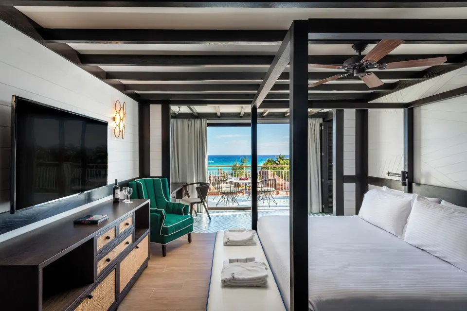 Privilege Master Suite Ocean Riviera Paradise king bed facing ocean balcony at Ocean Riviera Paradise.