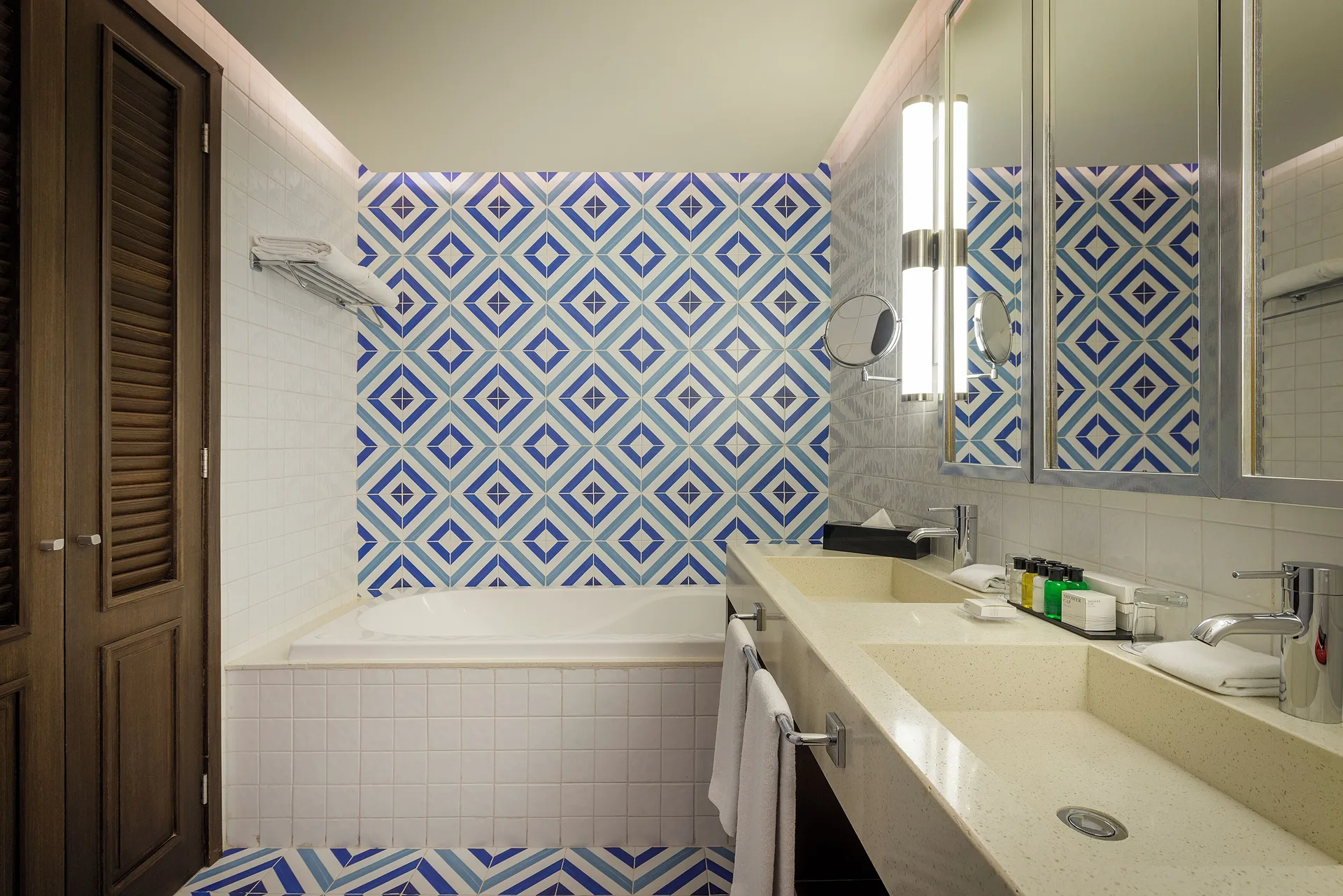 Roof Top Junior Suite Eden bathroom with tub and double sinks at Ocean Riviera Paradise.