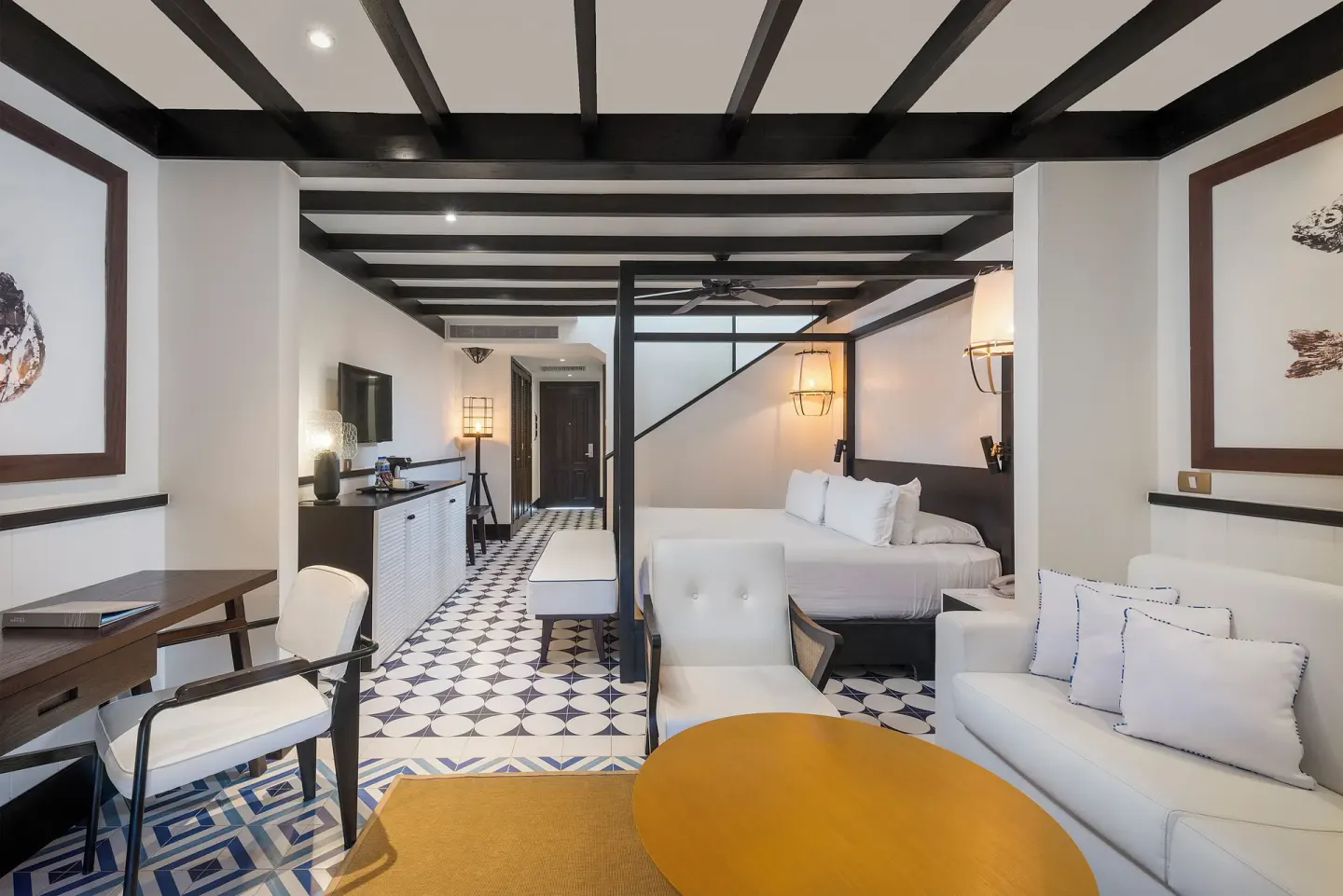Roof Top Junior Suite Eden living area and king bed at Ocean Riviera Paradise.