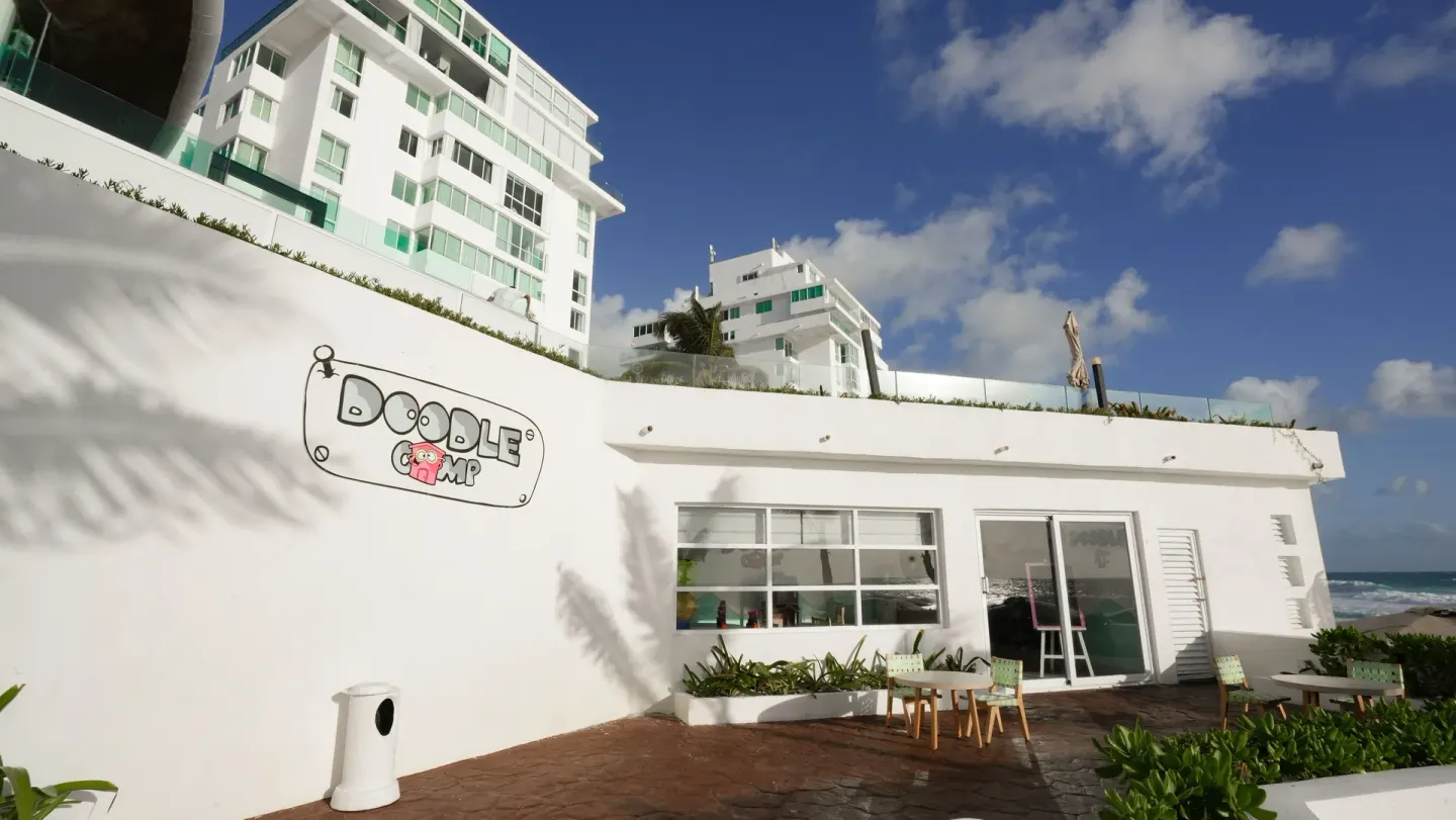 Exterior of a seaside kids club at Oleo Cancun Playa Resort.