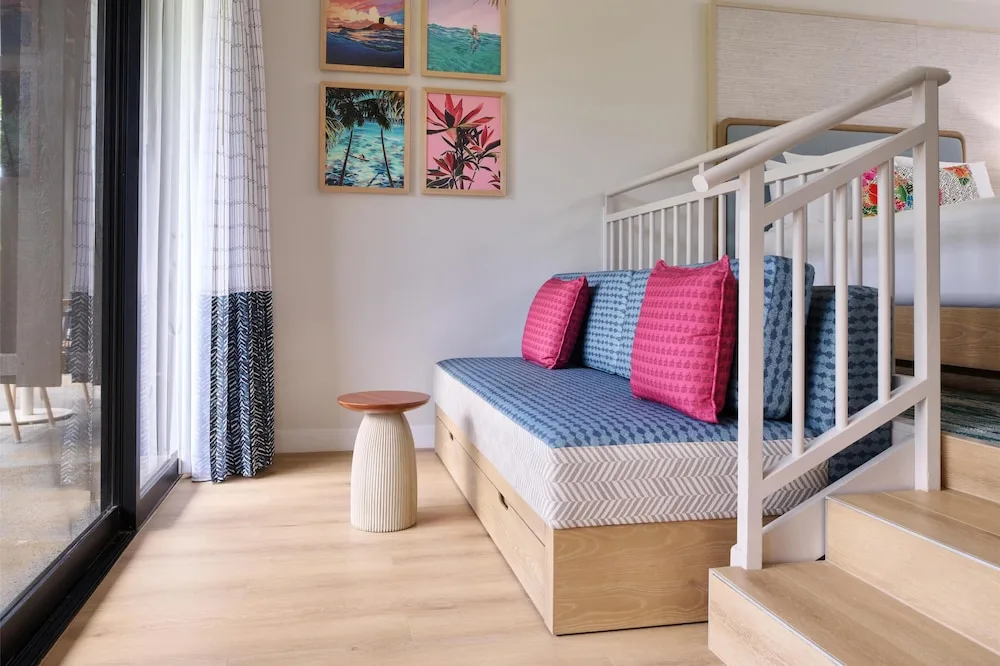 Guest room daybed nook beside sliding glass doors at Outrigger Kaanapali Beach Resort.