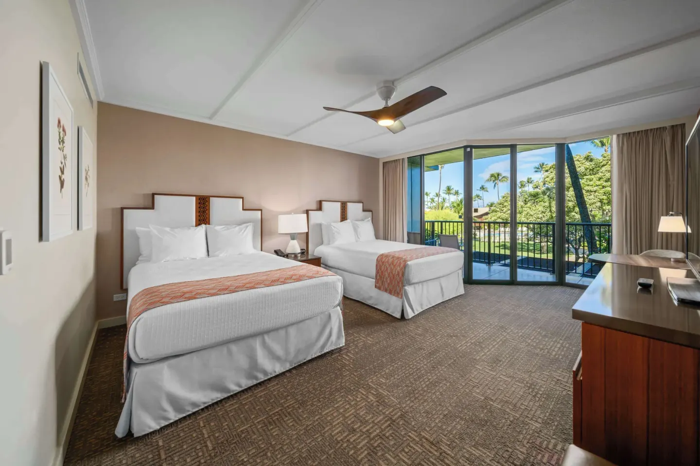 Two-bed guest room with lanai and garden view at Outrigger Kaanapali Beach Resort.