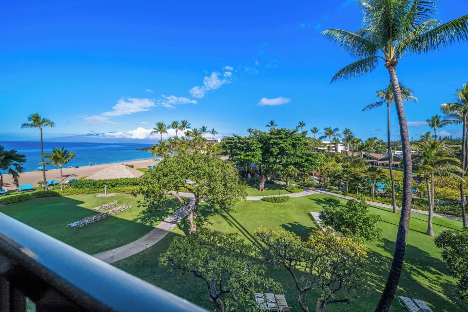 Wide ocean and lawn view from a Premium Room at Outrigger Kaanapali Beach Resort.