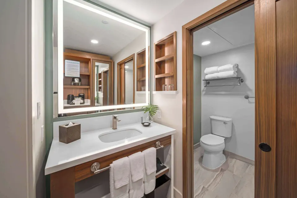 Premium Room bathroom vanity and toilet area at Outrigger Kaanapali Beach Resort.