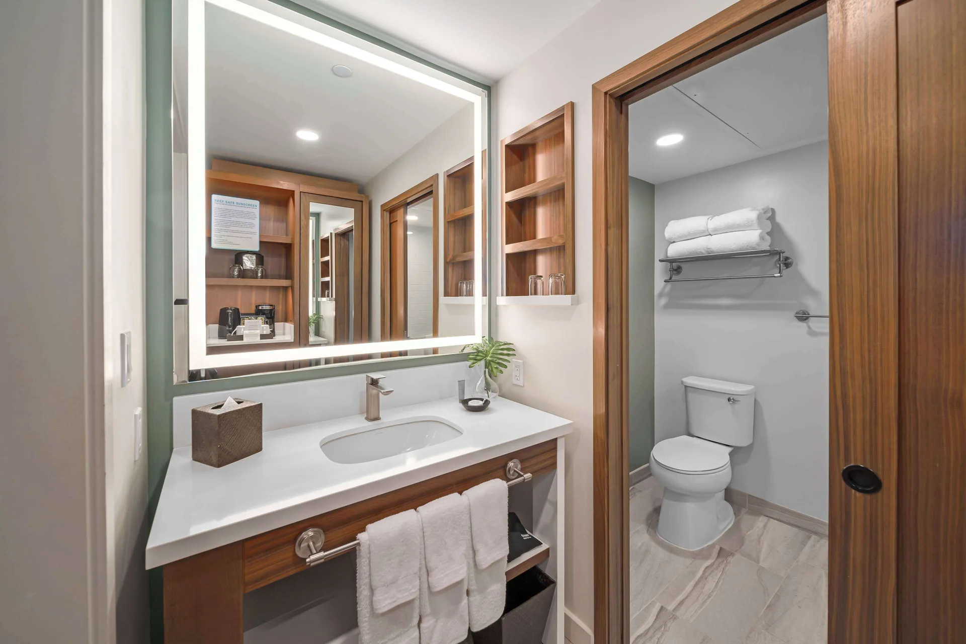 Premium Room bathroom vanity and toilet area at Outrigger Kaanapali Beach Resort.