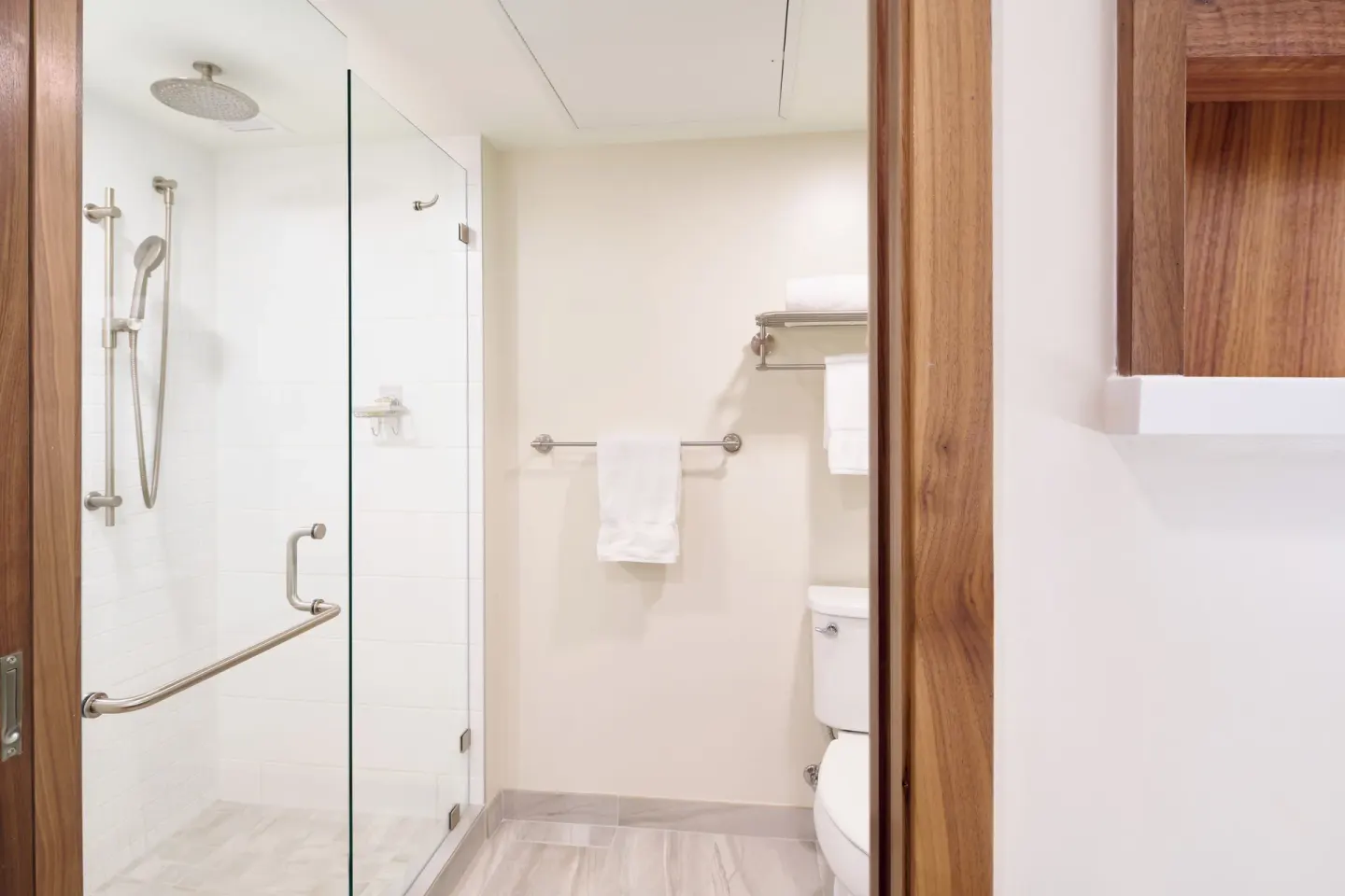 Glass walk-in shower in a Premium Room Partial Ocean View at Outrigger Kaanapali Beach Resort.
