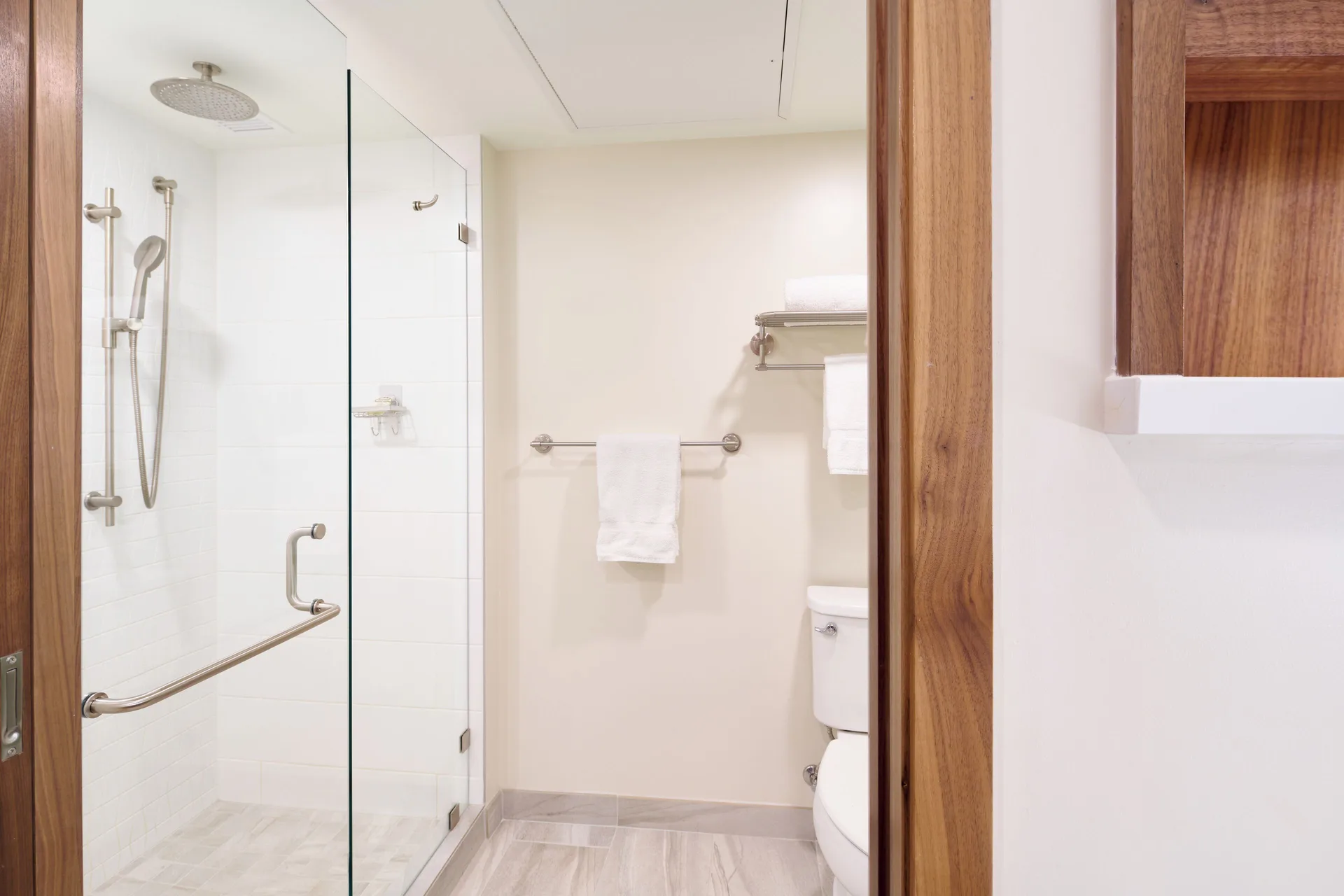 Glass walk-in shower in a Premium Room Partial Ocean View at Outrigger Kaanapali Beach Resort.