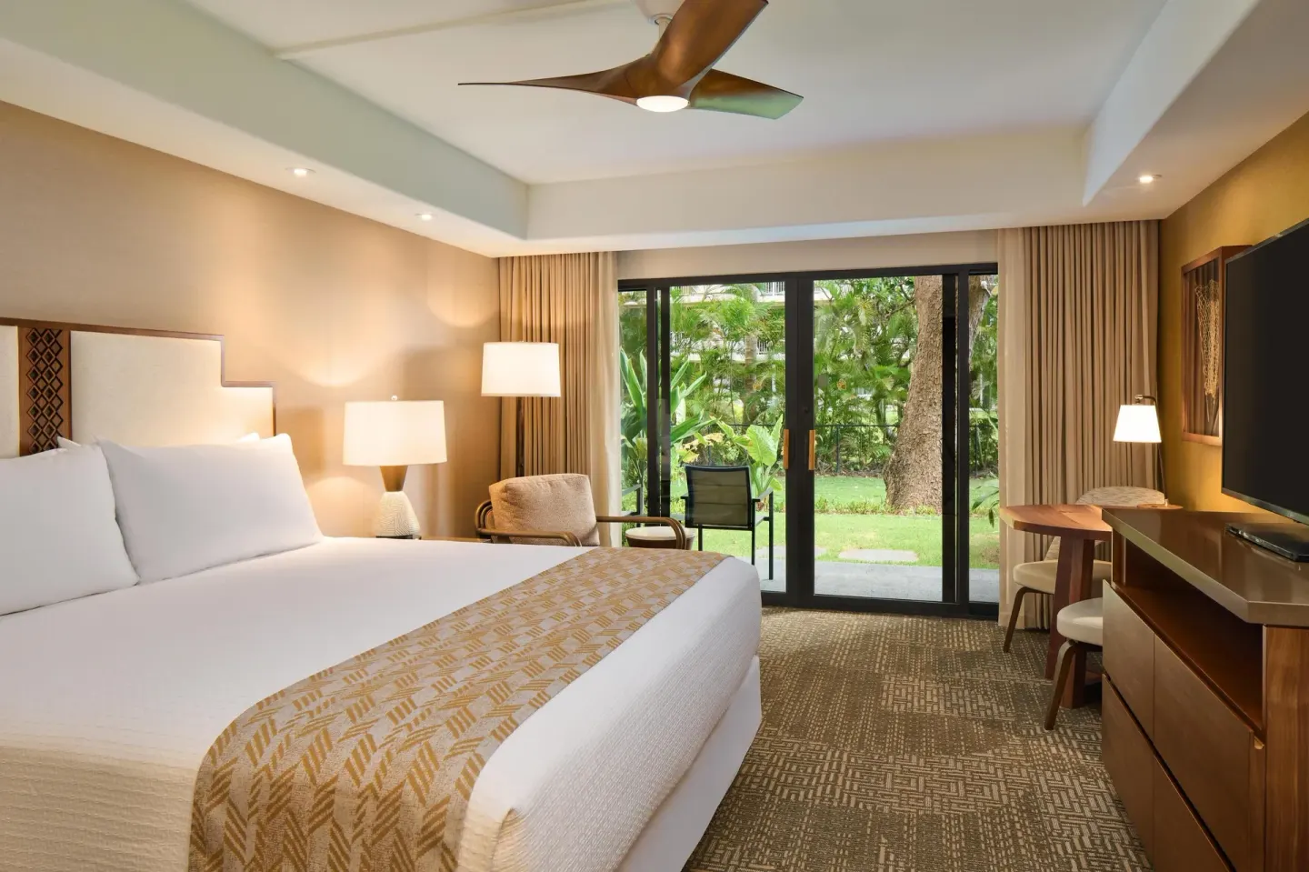Premium Resort View king room with garden patio at Outrigger Kaanapali Beach Resort.