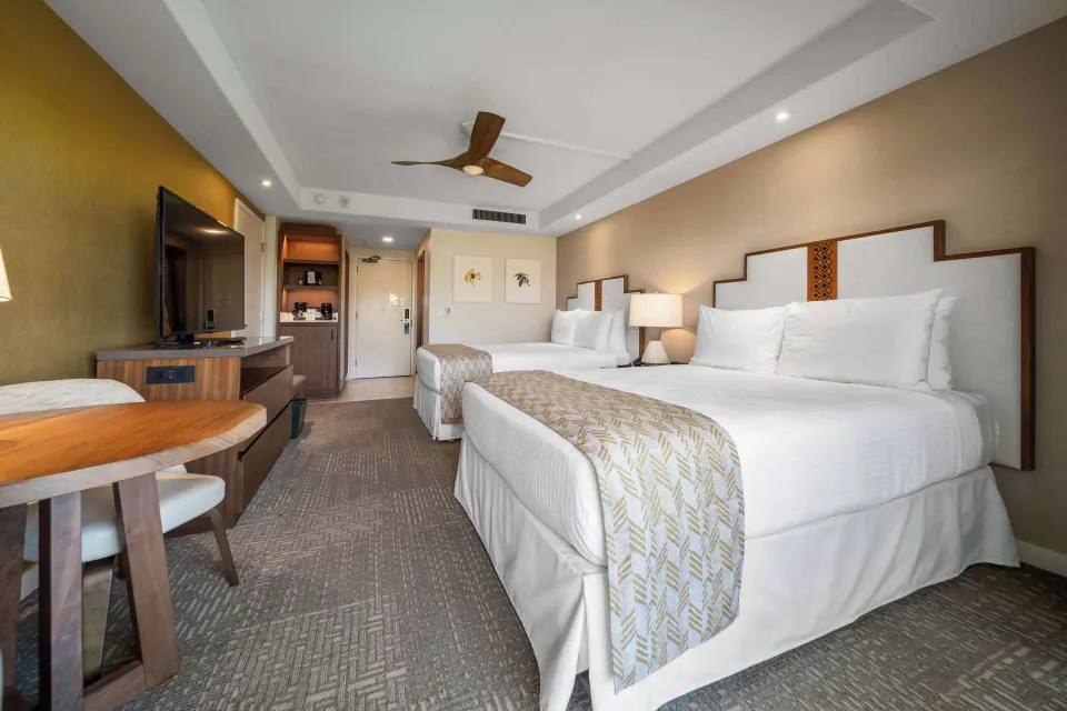 Premium Resort View room with two beds and entry area at Outrigger Kaanapali Beach Resort.