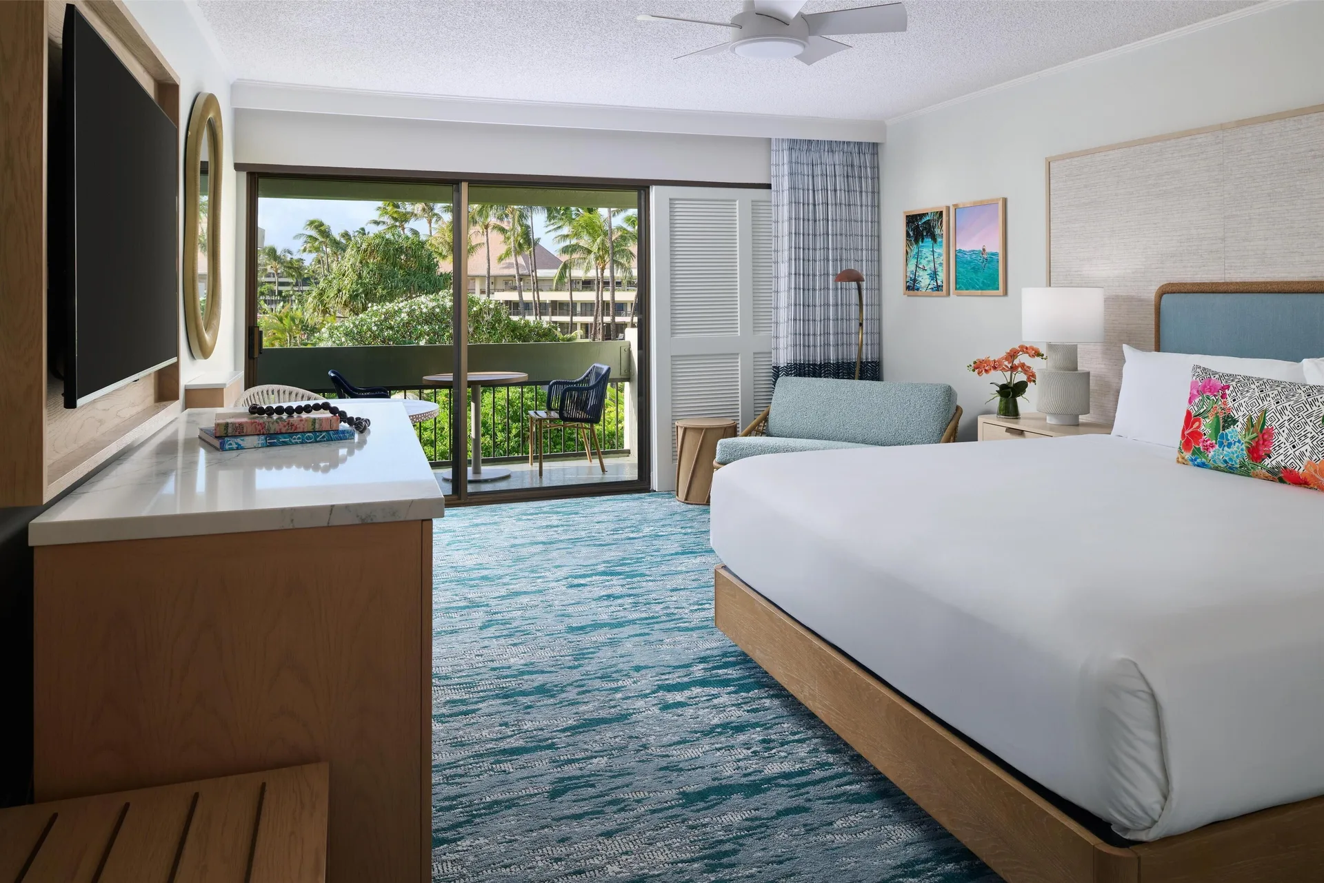 Signature Room Resort View king bed and balcony at Outrigger Kaanapali Beach Resort.