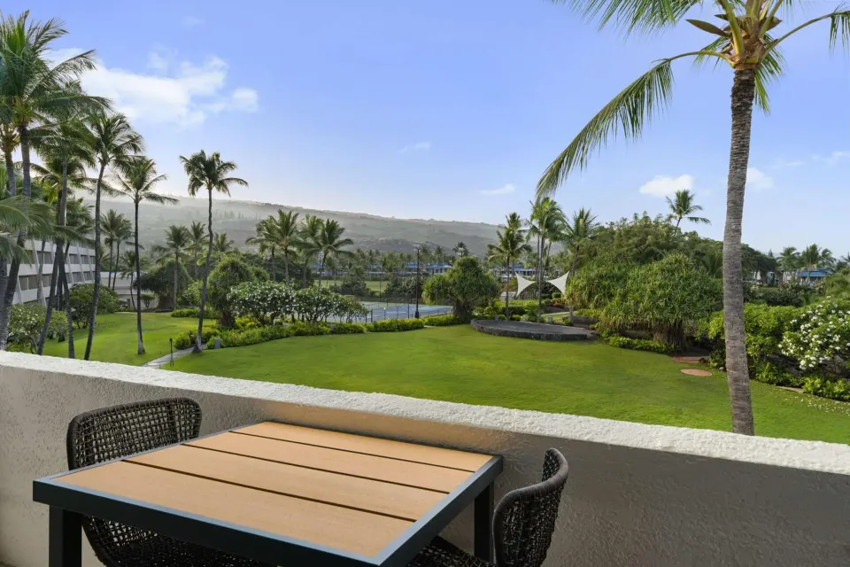 Resort View Room balcony with garden and palm views at Outrigger Kona Resort and Spa.