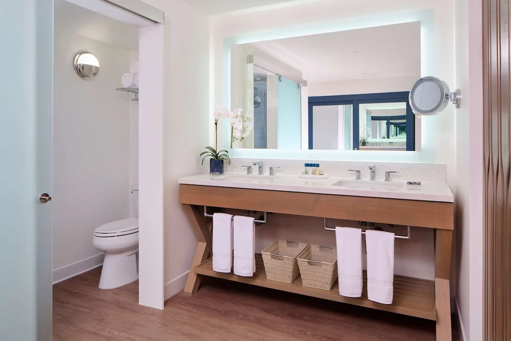 Double-sink guest bathroom vanity at OUTRIGGER Reef Waikiki Beach Resort.