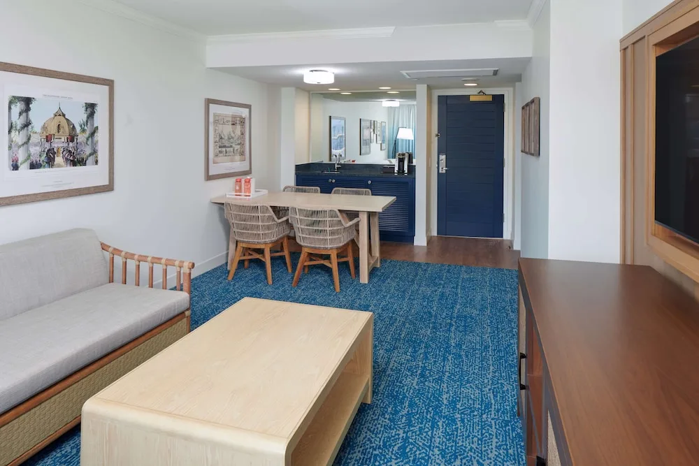 Guest room sitting area with dining table at OUTRIGGER Reef Waikiki Beach Resort.