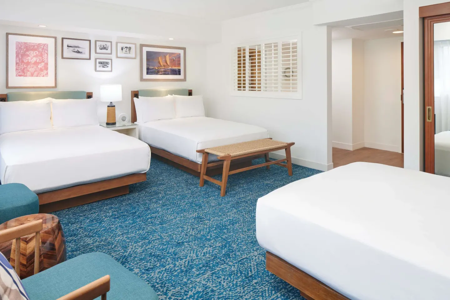 Spacious three-bed guest room at OUTRIGGER Reef Waikiki Beach Resort.