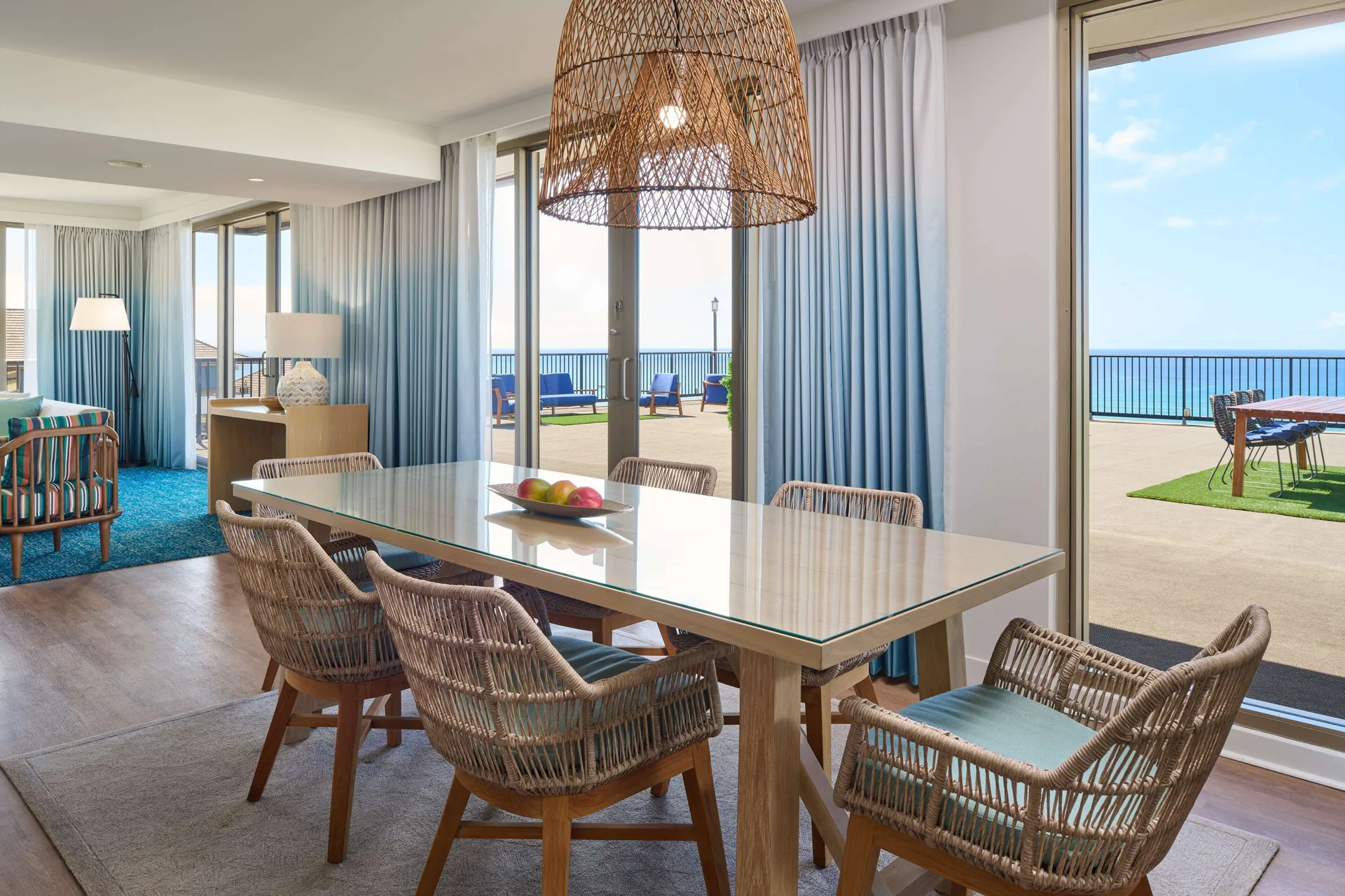 Oceanfront suite dining area and terrace at OUTRIGGER Reef Waikiki Beach Resort.