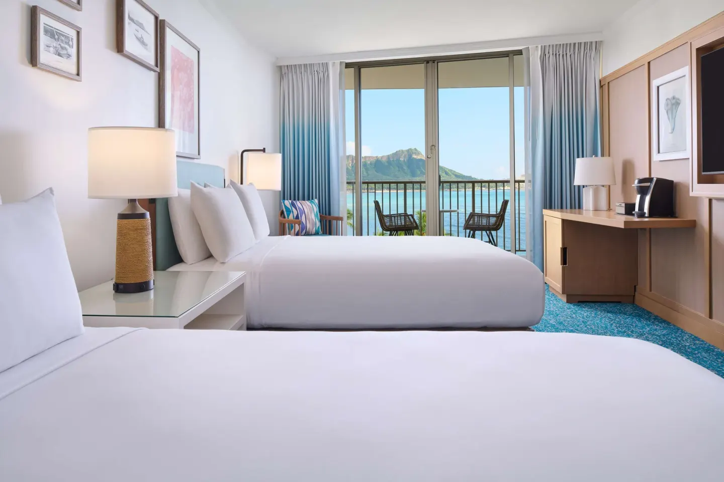 Two-bed guest room with Diamond Head view at OUTRIGGER Reef Waikiki Beach Resort.