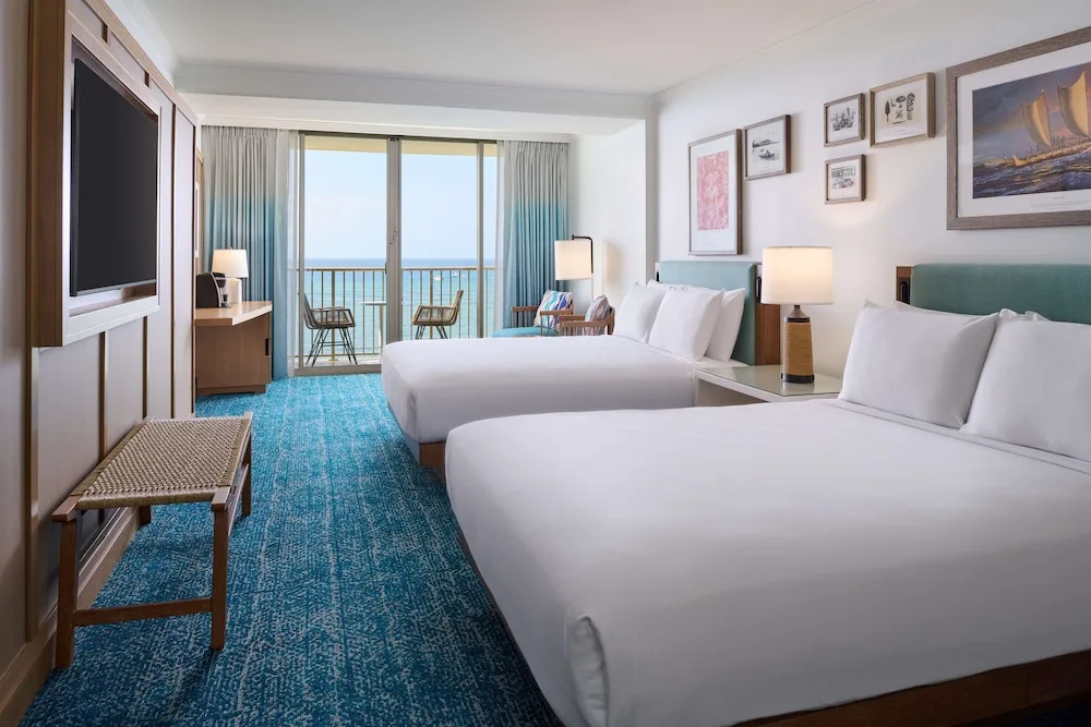 Two-bed ocean view guest room at OUTRIGGER Reef Waikiki Beach Resort.