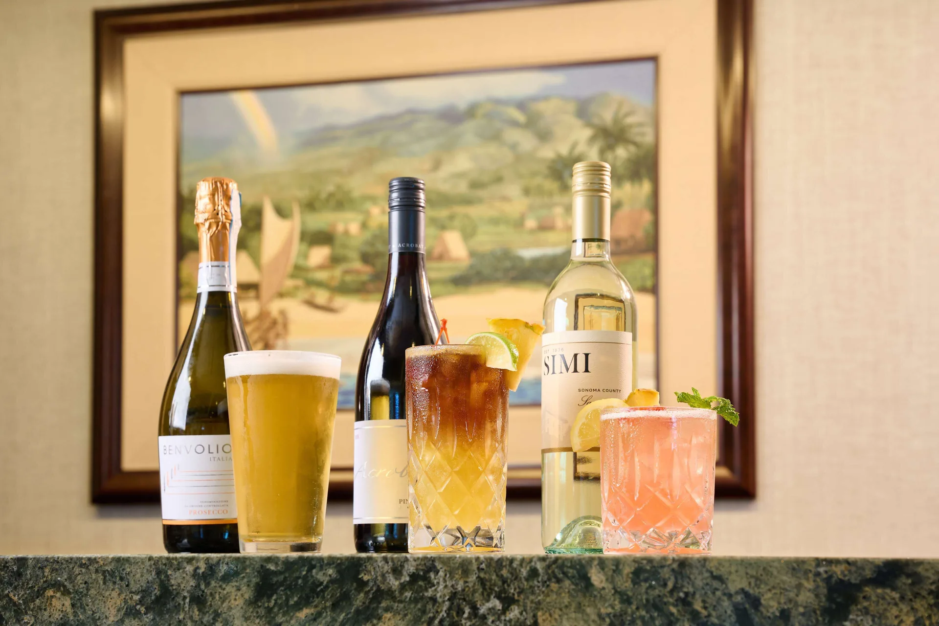 Beer, cocktails, and wine bottles displayed at OUTRIGGER Reef Waikiki Beach Resort.
