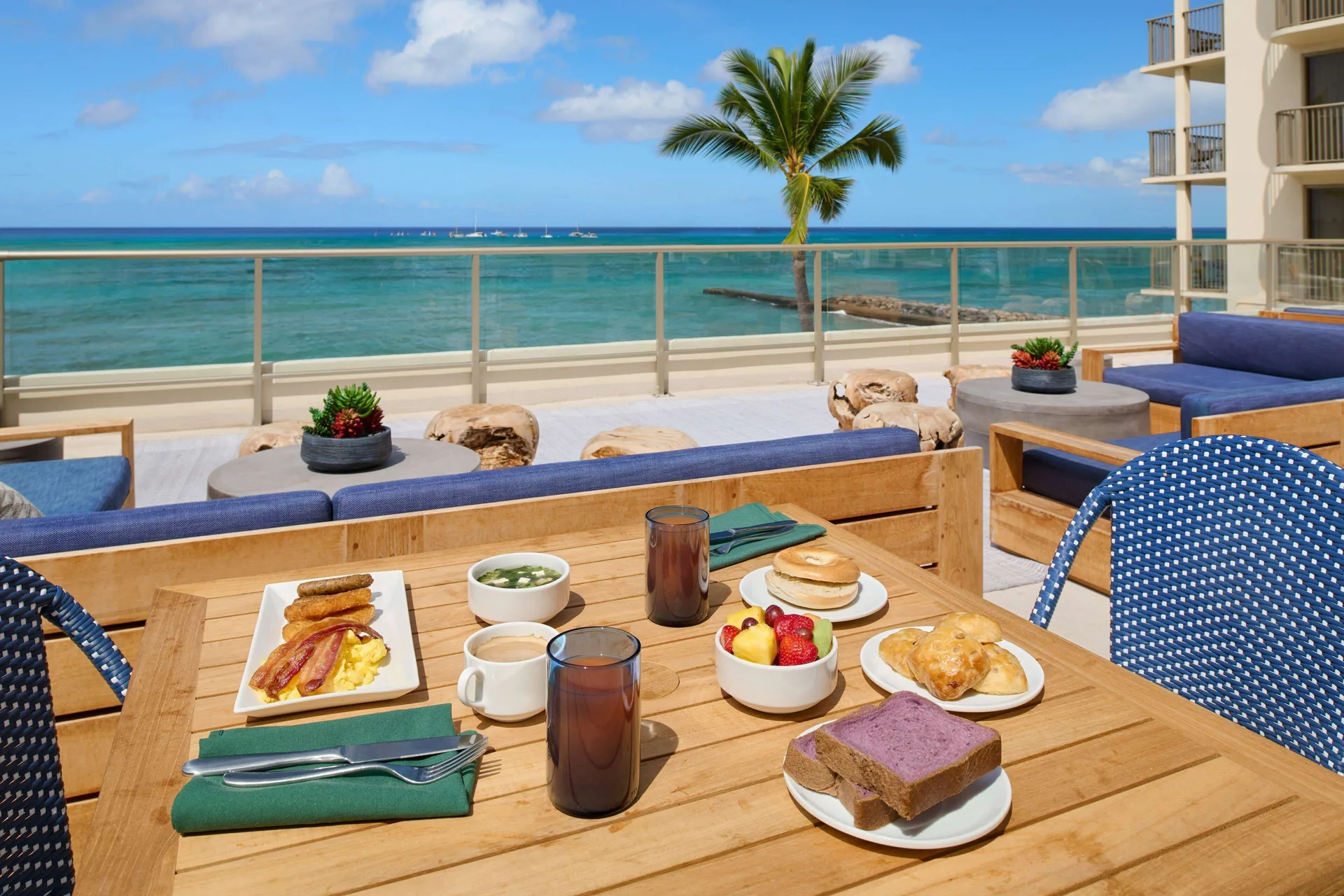Club breakfast on an oceanfront terrace at OUTRIGGER Reef Waikiki Beach Resort.
