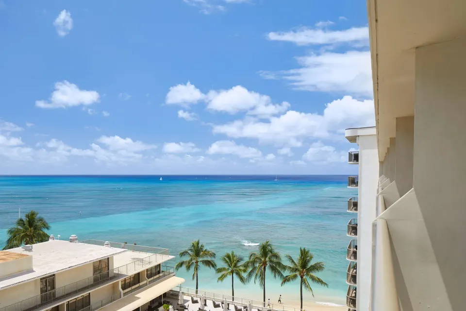 Ocean and beach view from a balcony at OUTRIGGER Reef Waikiki Beach Resort.