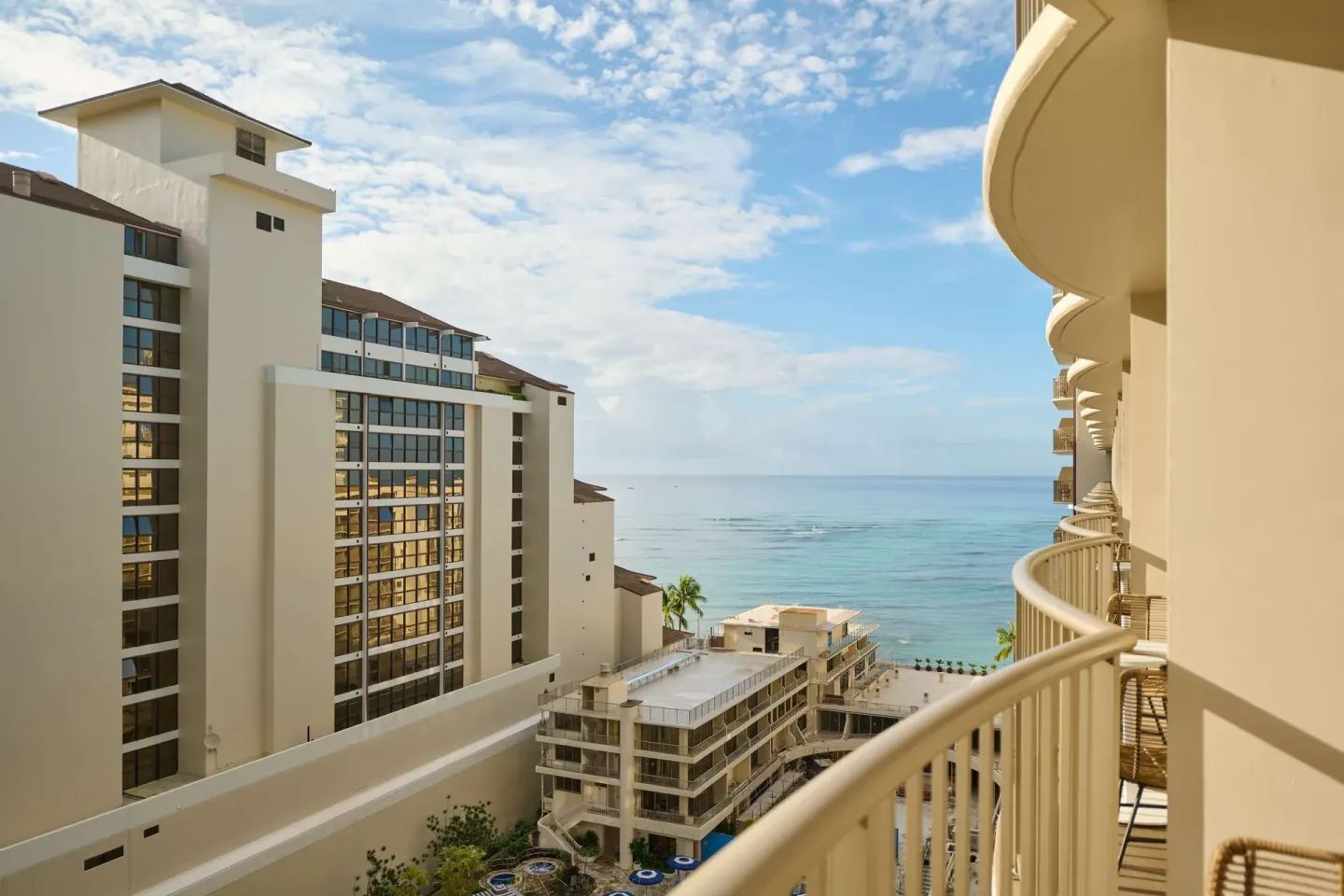 Balcony with partial ocean view at OUTRIGGER Reef Waikiki Beach Resort.