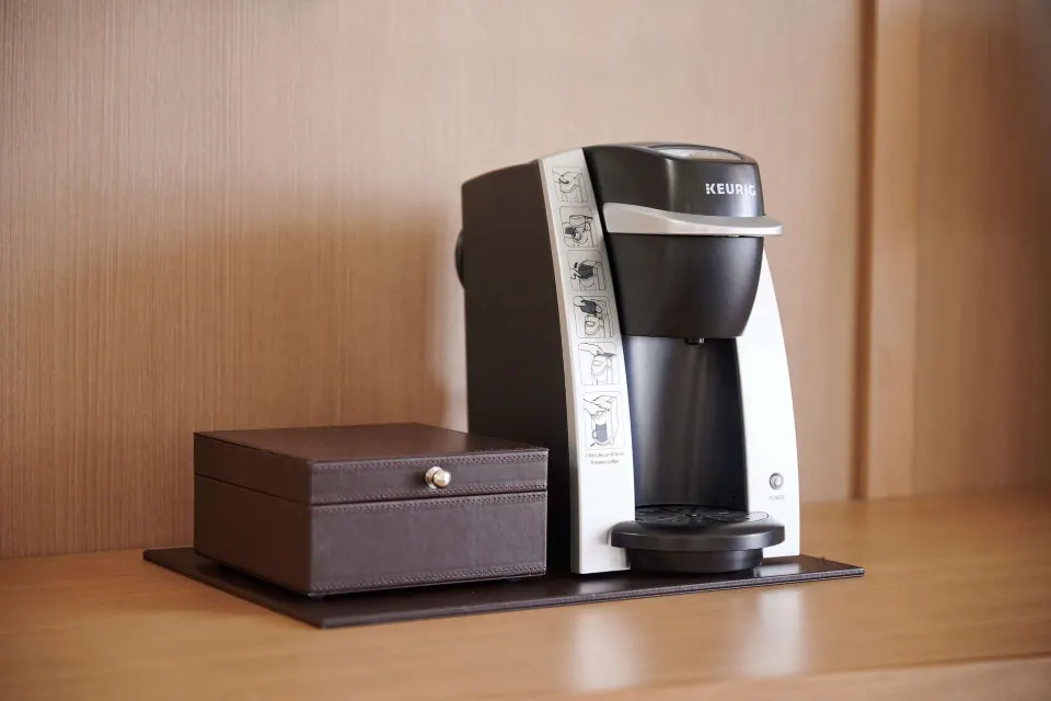 In-room coffee maker and storage box at OUTRIGGER Reef Waikiki Beach Resort.