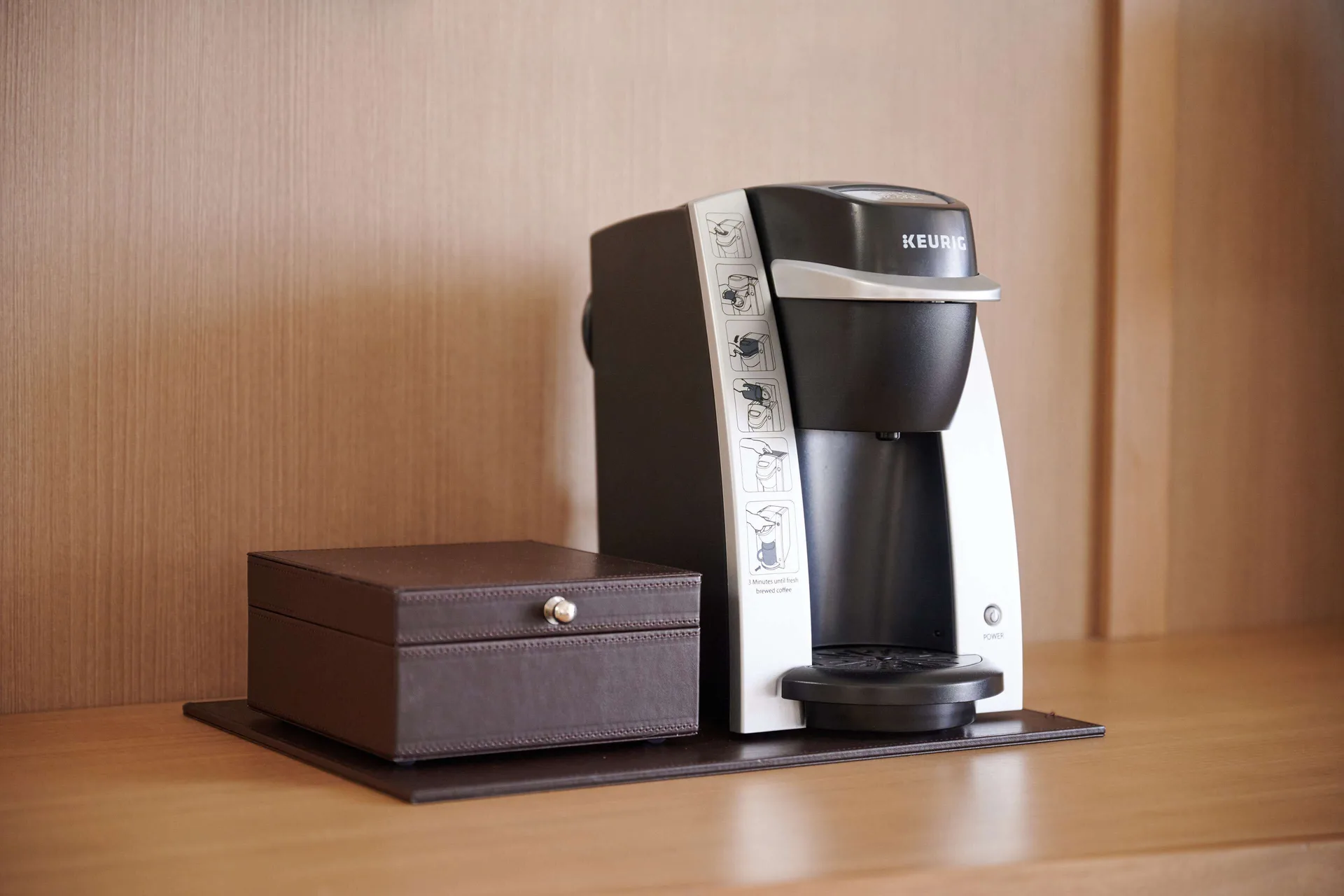 In-room coffee maker and storage box at OUTRIGGER Reef Waikiki Beach Resort.