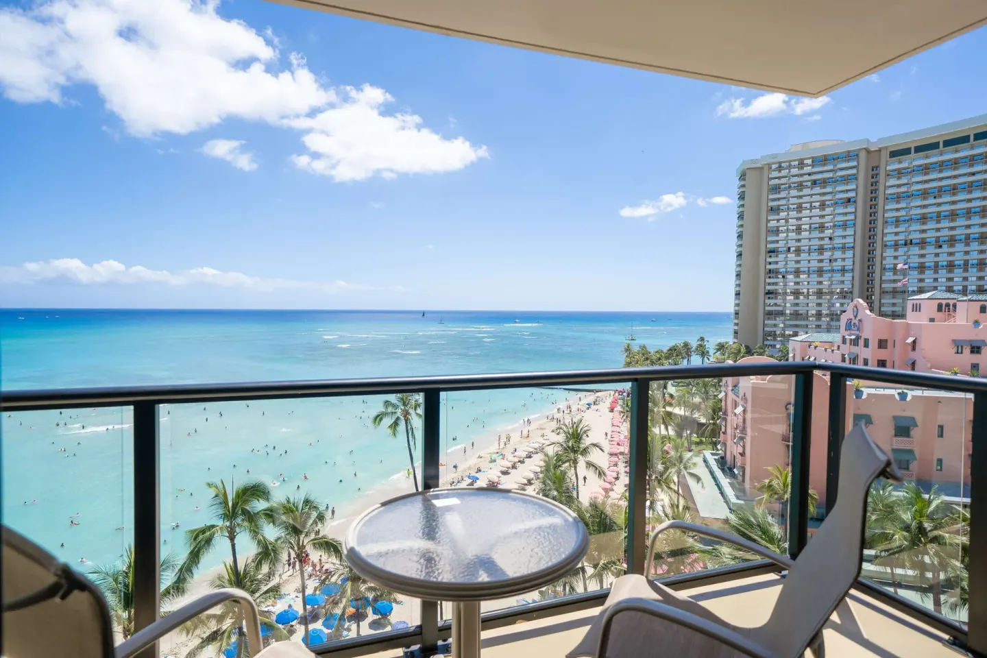 Balcony seating overlooking Waikiki Beach and ocean at Outrigger Waikiki Beach Resort.