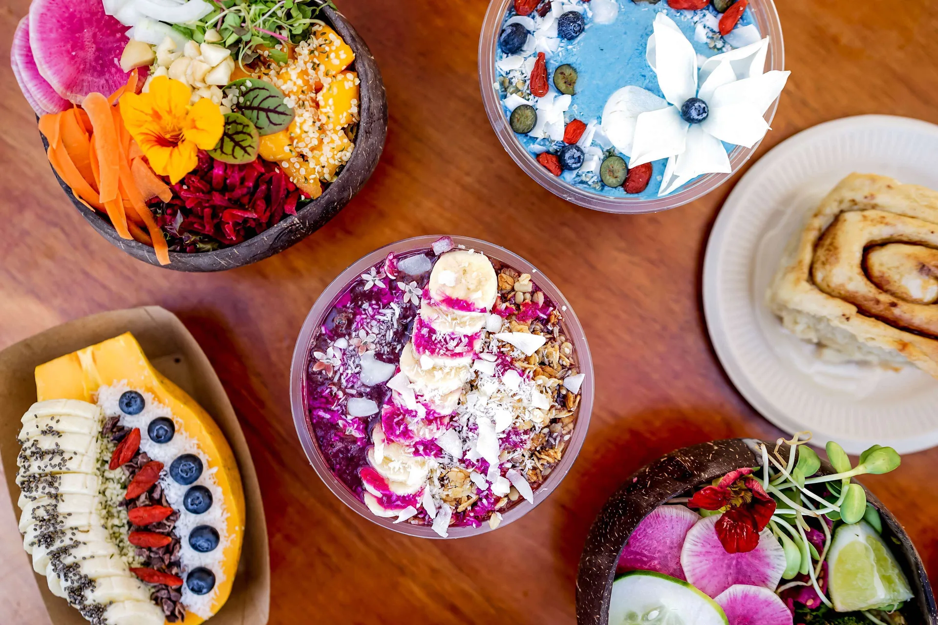 Colorful smoothie bowls, fresh vegetables and pastries at Outrigger Waikiki Beach Resort.