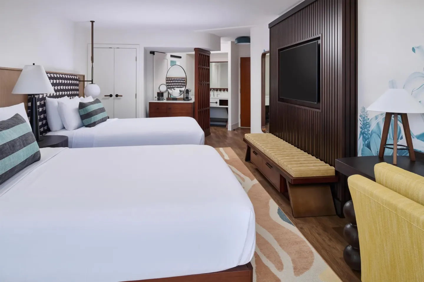 Club Room with two beds and media wall at Outrigger Waikiki Beach Resort.