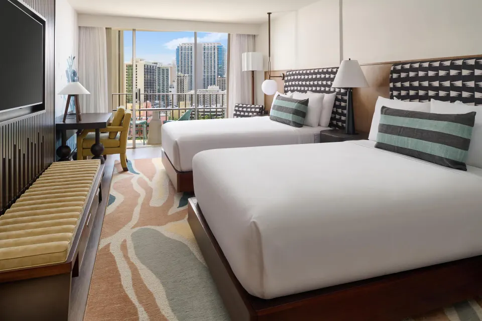 Club Room Partial Ocean View two beds and balcony at Outrigger Waikiki Beach Resort.