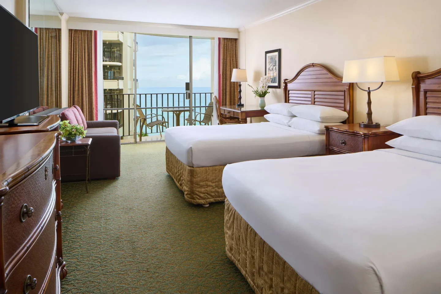 Ocean view room with two beds and balcony at Outrigger Waikiki Beach Resort.