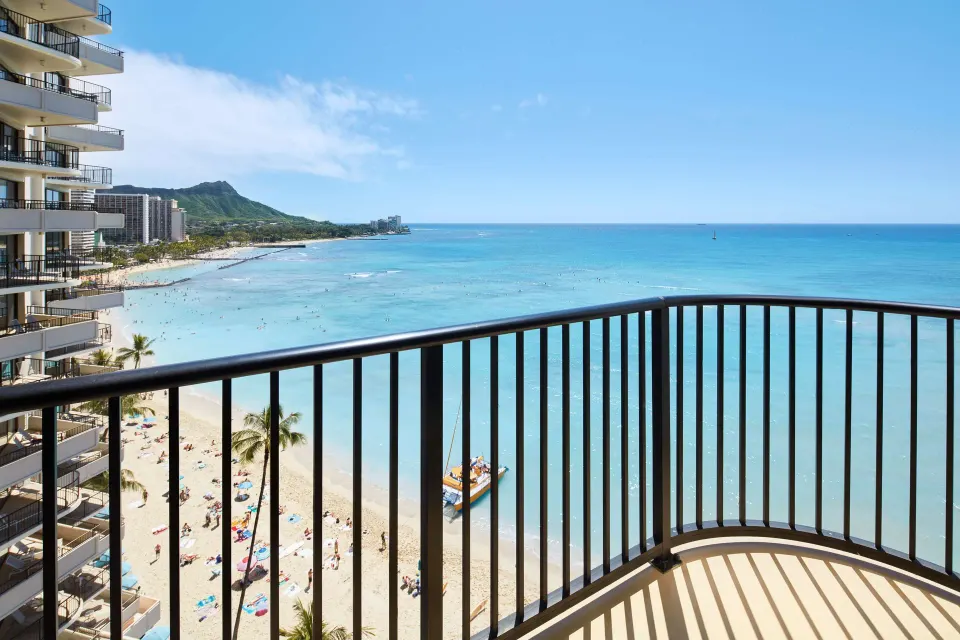 Oceanfront balcony view of Waikiki Beach and Diamond Head at Outrigger Waikiki Beach Resort.