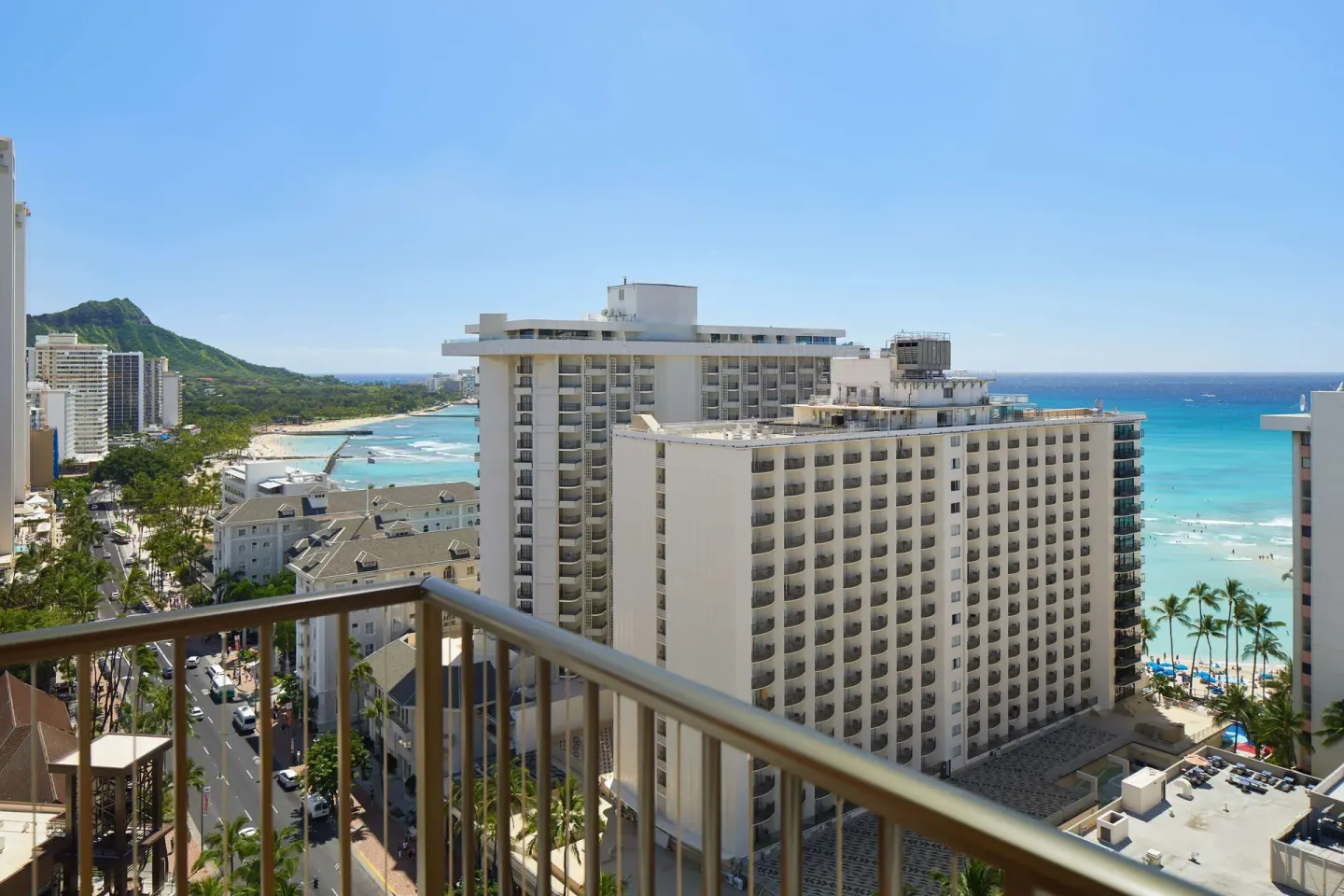 Balcony view of Waikiki Beach, Diamond Head, and high-rise hotels at OUTRIGGER Waikiki Beachcomber Hotel.