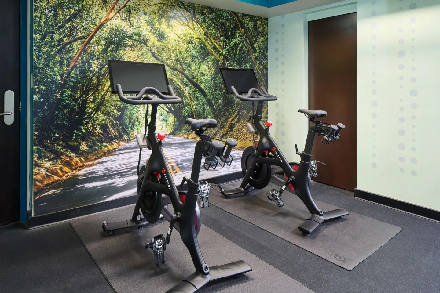 Stationary bikes in the fitness room at OUTRIGGER Waikiki Beachcomber Hotel.