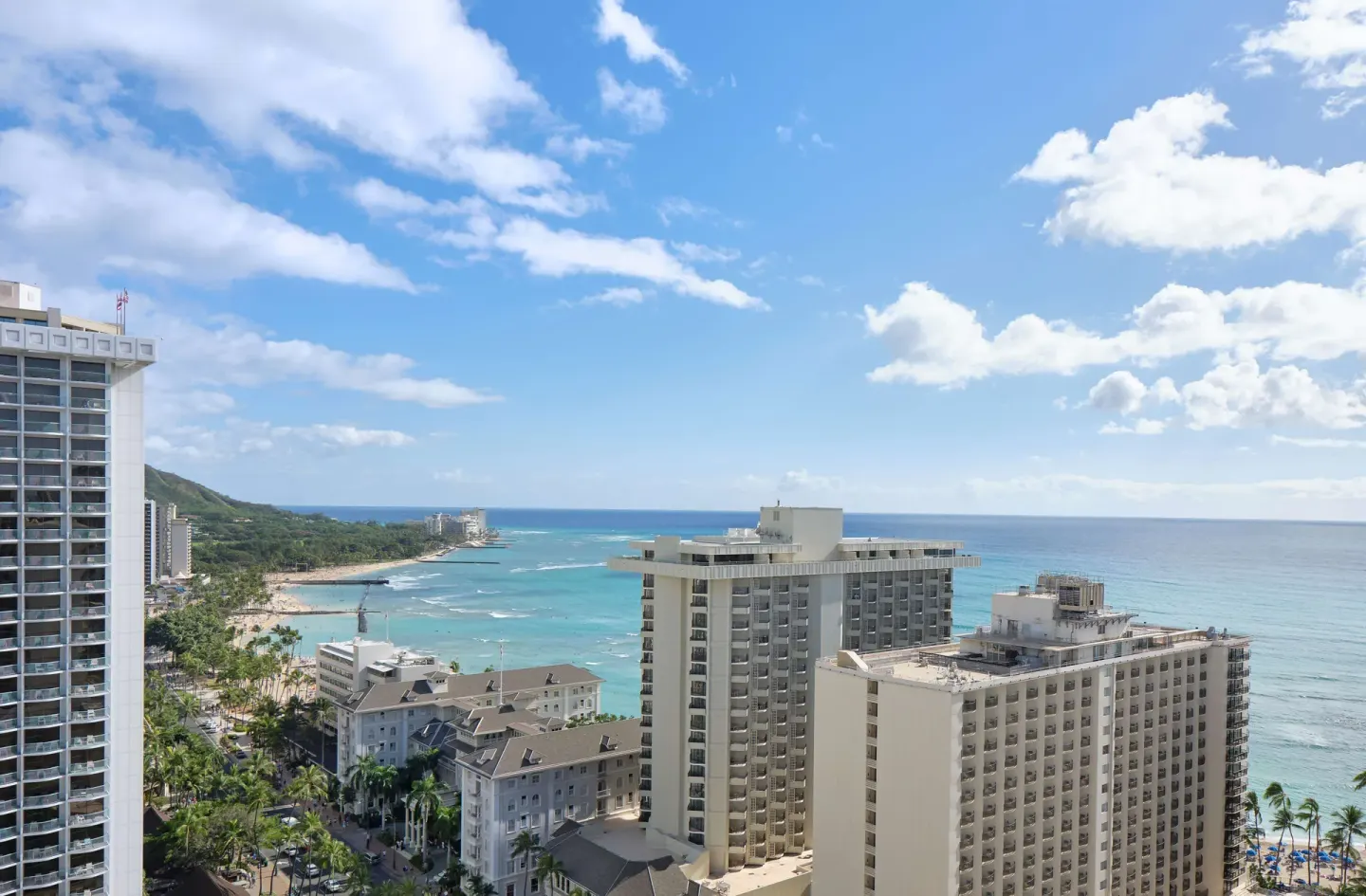Ocean view over Waikiki buildings and beach from OUTRIGGER Waikiki Beachcomber Hotel.
