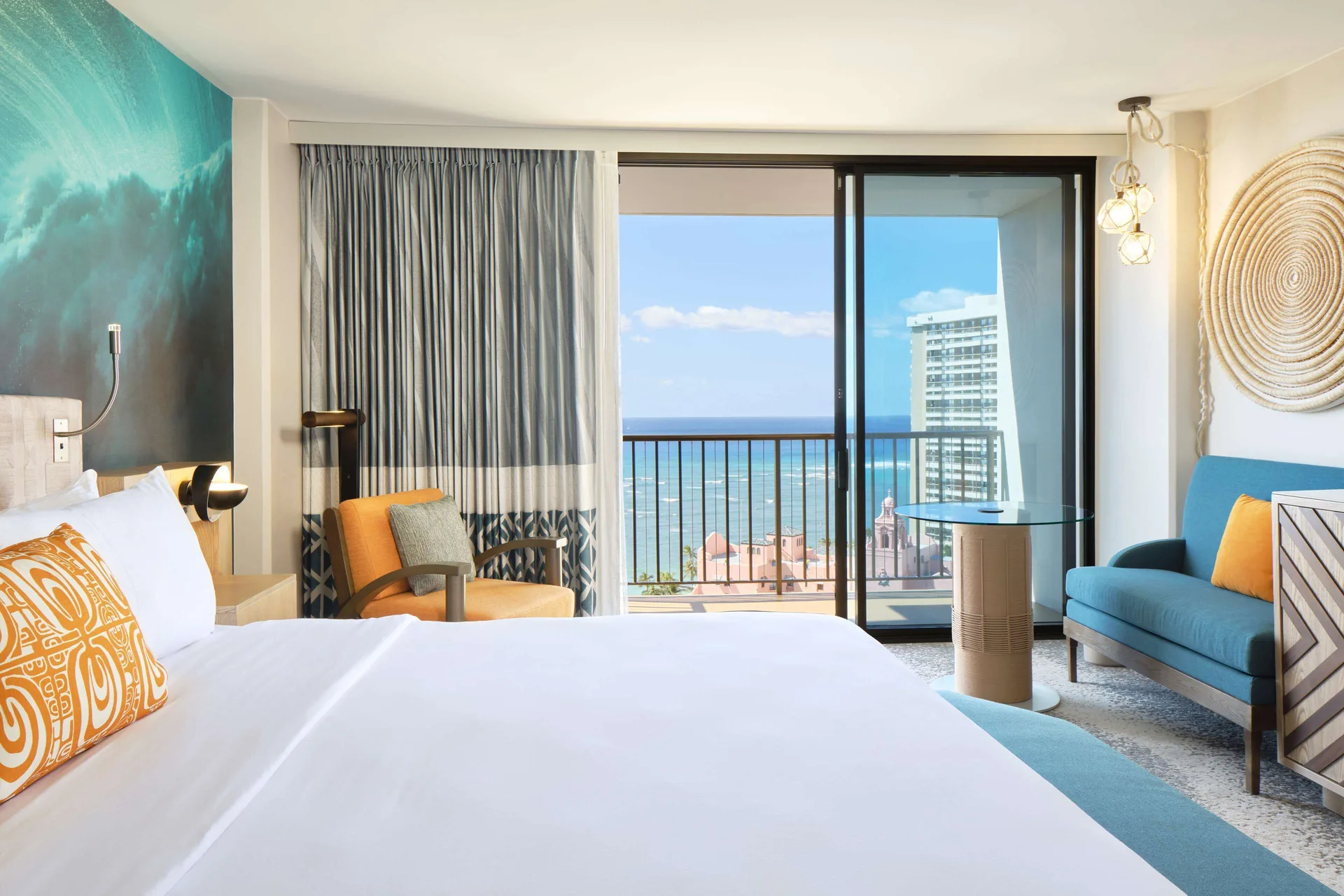 Room Ocean View Diamond Head at OUTRIGGER Waikiki Beachcomber Hotel with king bed, seating area, and ocean balcony overlooking Diamond Head in Waikiki.