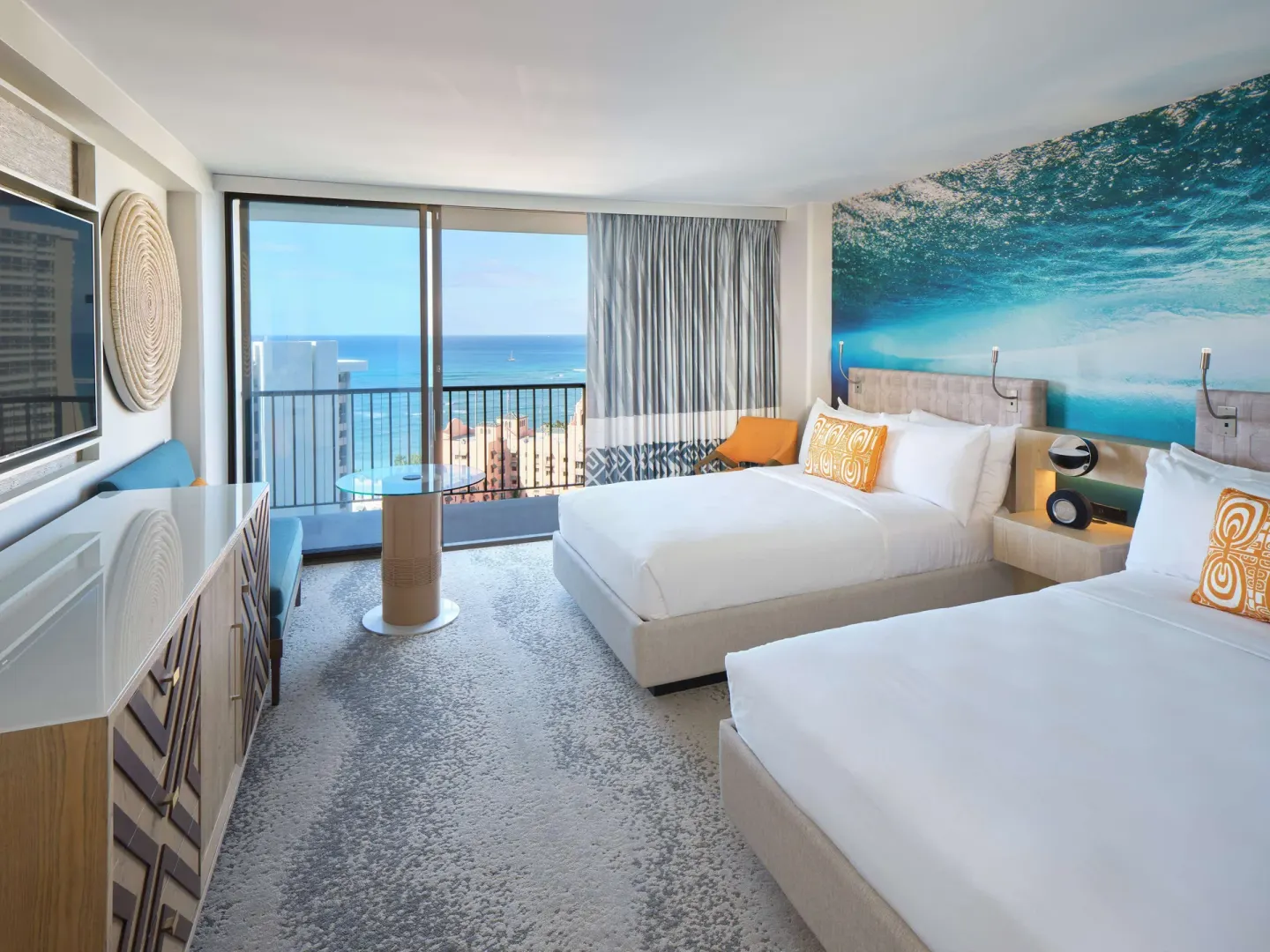 Two-bed ocean view guest room at OUTRIGGER Waikiki Beachcomber Hotel.