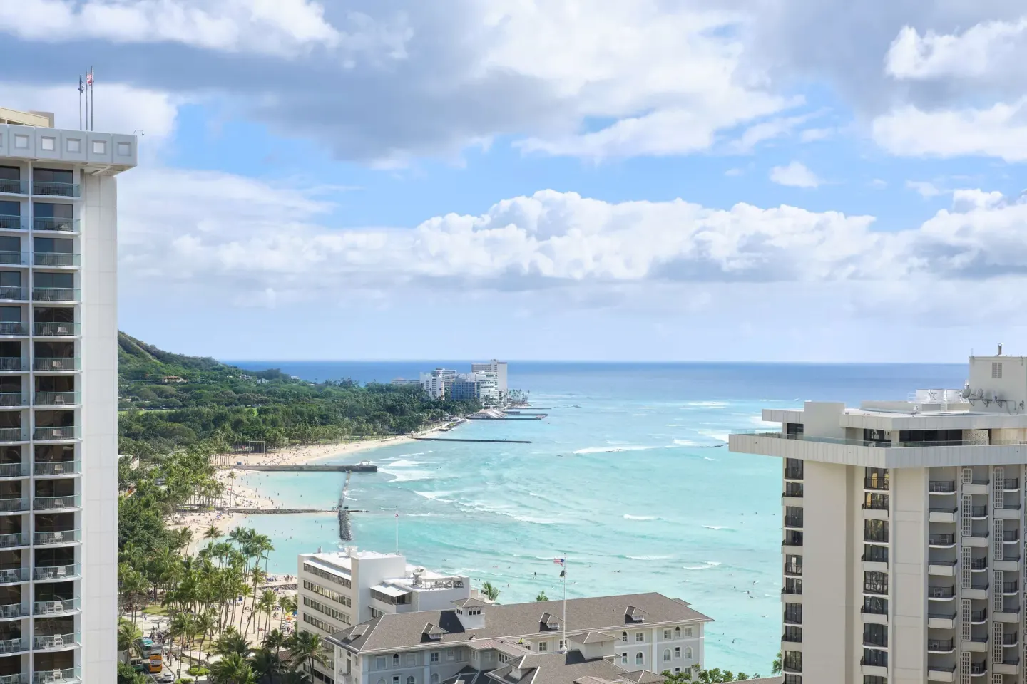 Ocean view from a guest room at OUTRIGGER Waikiki Beachcomber Hotel with Waikiki Beach below.