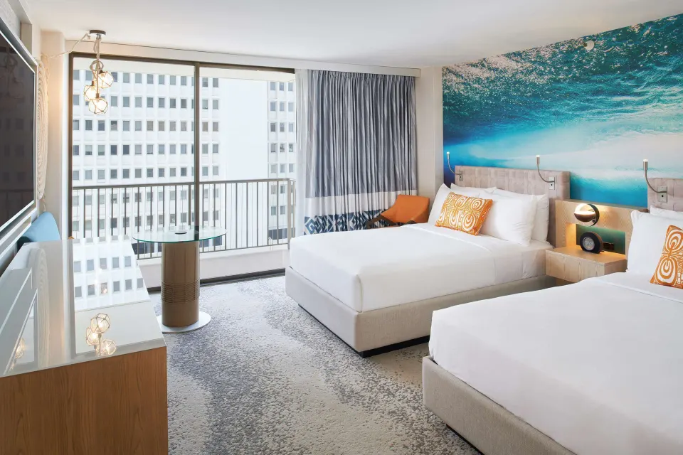 Waikiki View Double room with two beds and balcony at Outrigger Waikiki Beachcomber Hotel.
