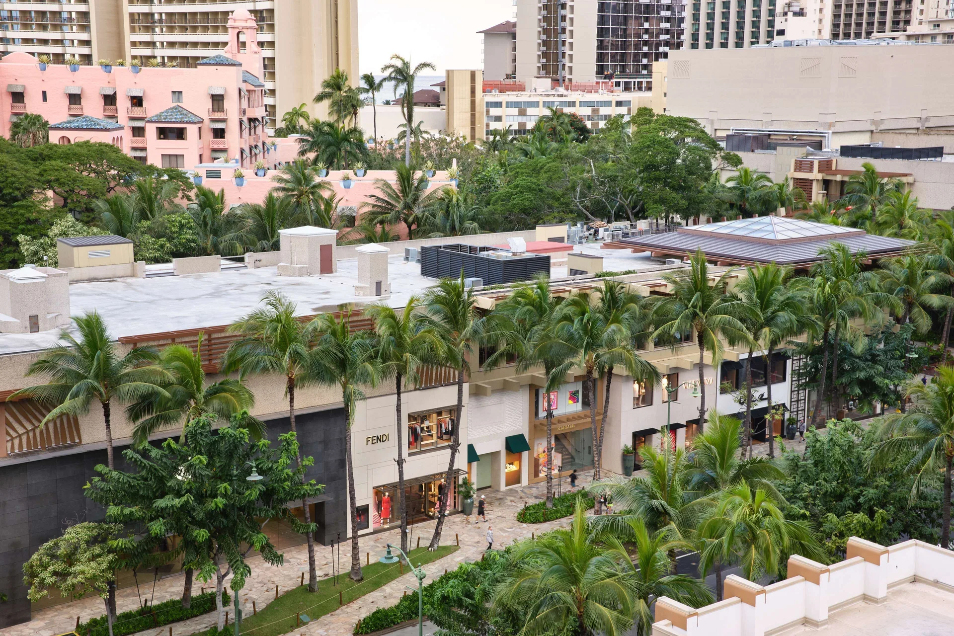 Waikiki view with palms and shopping streets from OUTRIGGER Waikiki Beachcomber Hotel.
