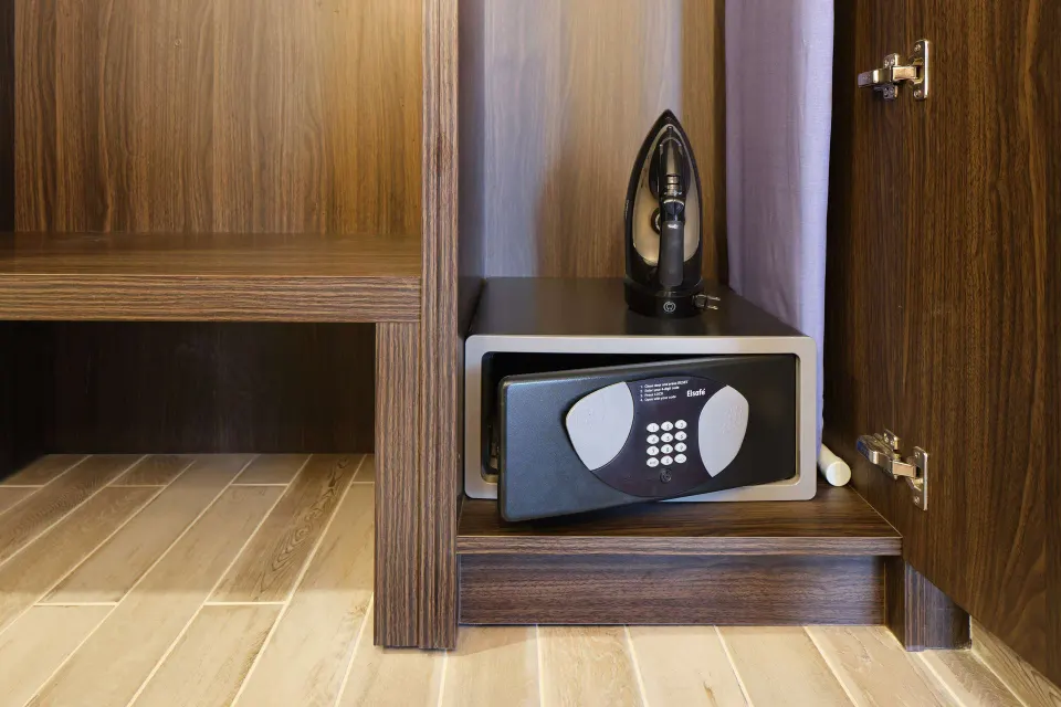 Guest room closet safe and iron at OUTRIGGER Waikiki Beachcomber Hotel.
