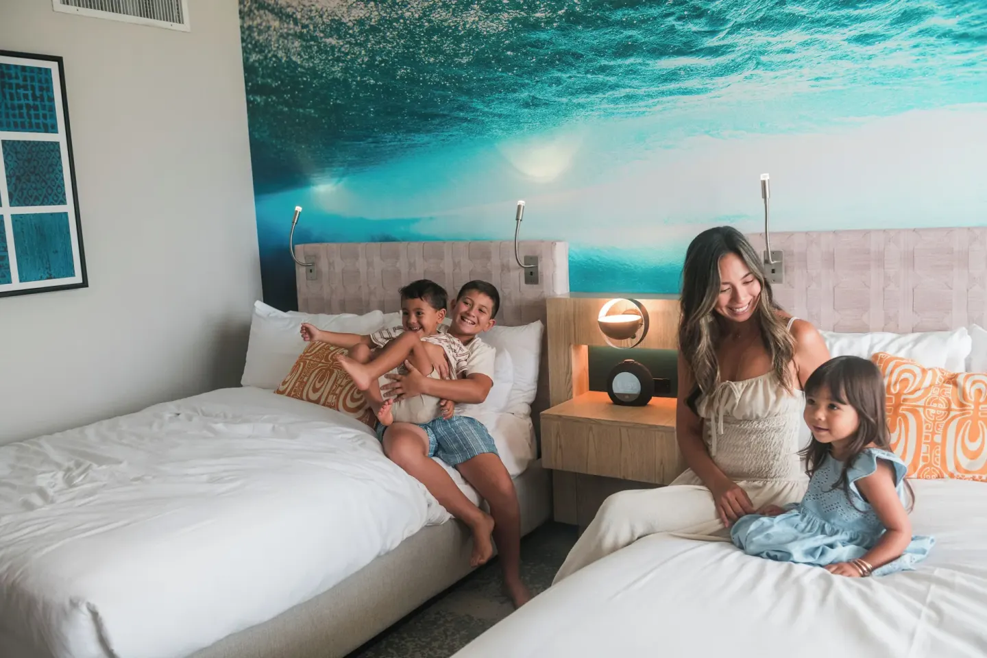 Two-bed Waikiki View room with bedside lighting at OUTRIGGER Waikiki Beachcomber Hotel.