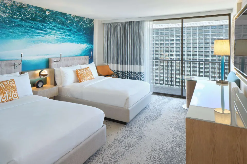 Two-bed Waikiki view guest room at OUTRIGGER Waikiki Beachcomber Hotel.