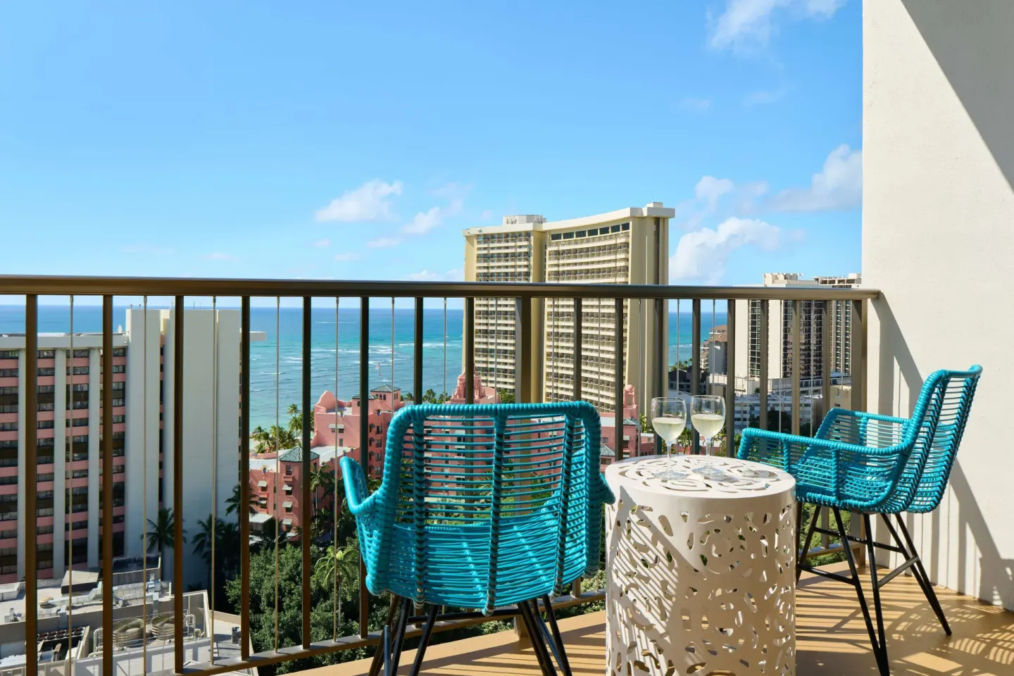 Balcony seating with ocean view at OUTRIGGER Waikiki Beachcomber Hotel.