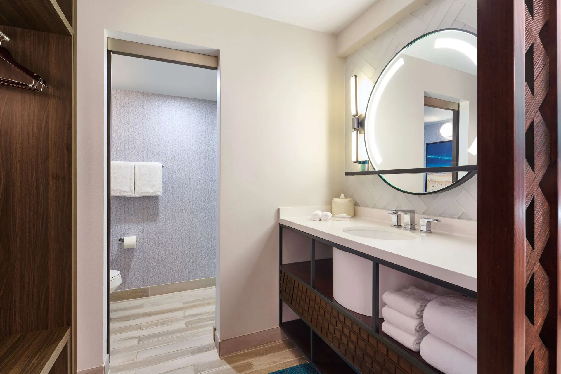 Suite Ocean View 1 Bedroom at OUTRIGGER Waikiki Beachcomber Hotel with modern bathroom vanity and premium finishes in Waikiki, Honolulu.